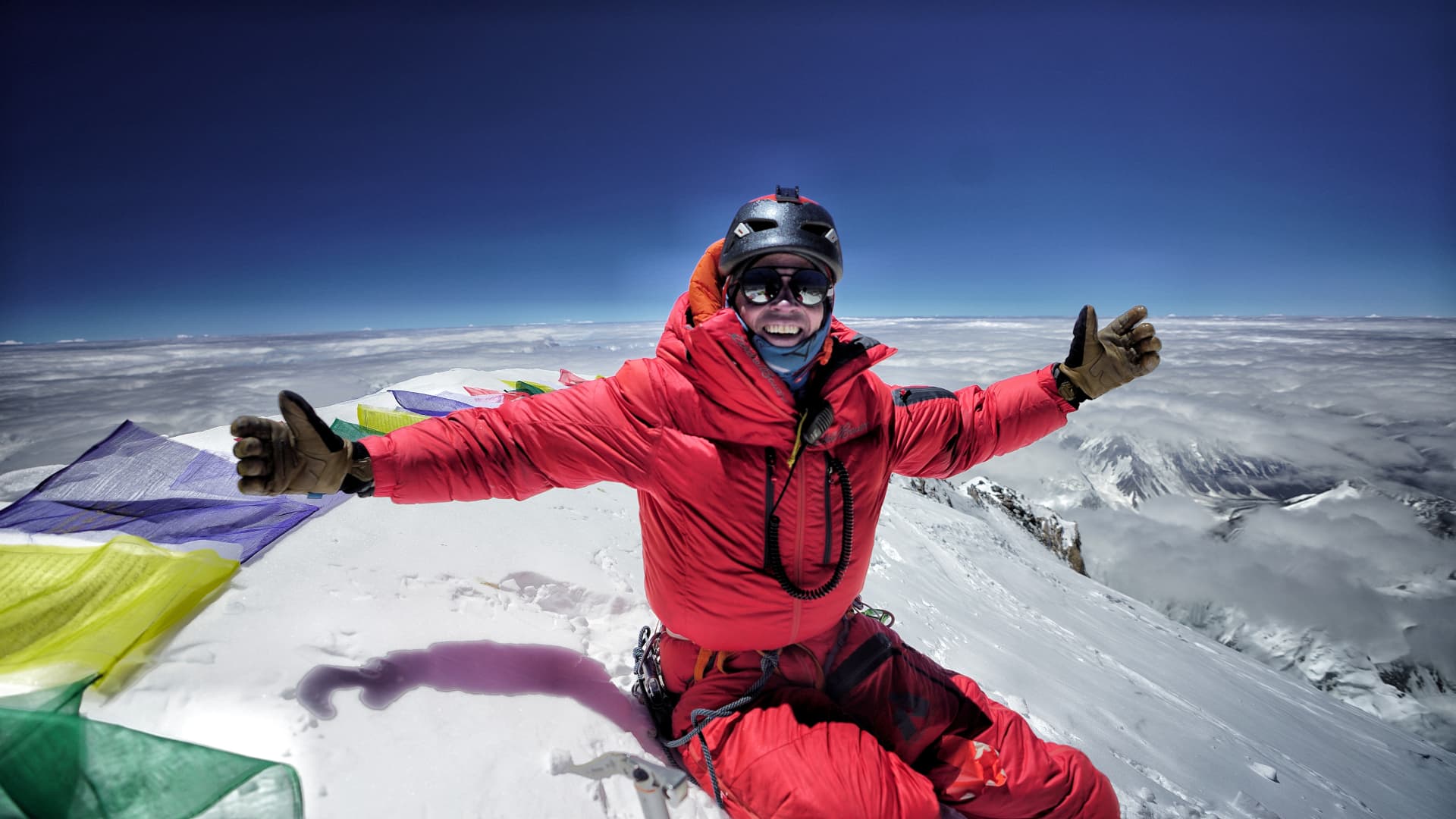 Adrian Ballinger, pictured at the summit of K2, the world's second-highest peak after Mount Everest.
