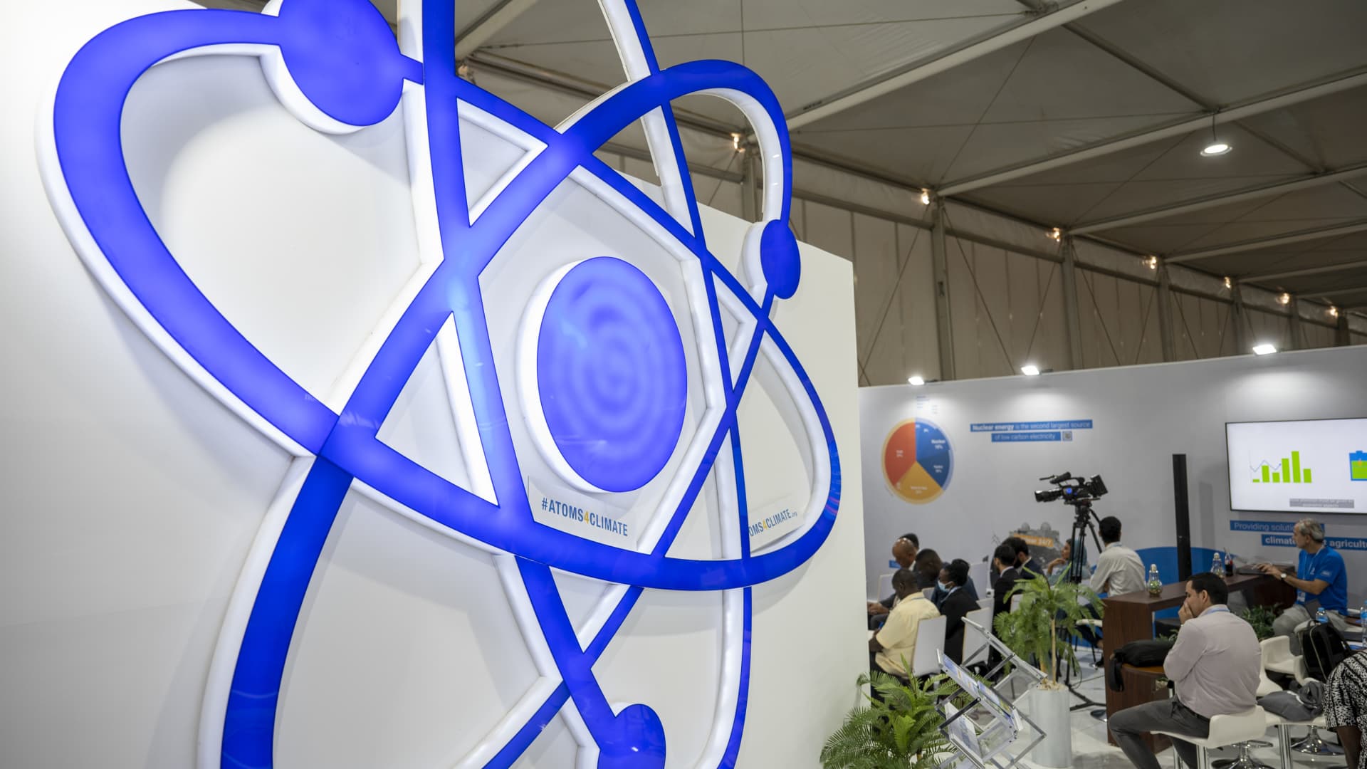15 November 2022, Egypt, Scharm El Scheich: A nuclear symbol is displayed at a pavilion of the International Atomic Energy Agency IAEA at the UN Climate Summit COP27. Photo: Christophe Gateau/dpa