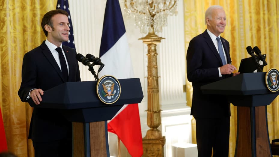 French President Emmanuel Macron and U.S. President Joe Biden hold a joint news conference in the East Room of the White House in Washington, December 1, 2022.
