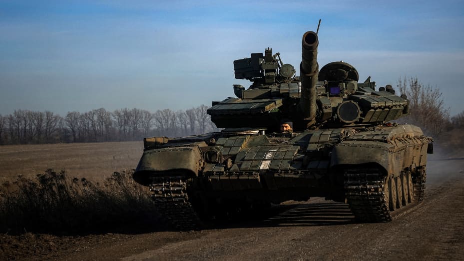 A Ukrainian tank runs on a road near Bakhmut, in the Donetsk region, on Dec. 2, 2022, amid the Russian invasion of Ukraine.