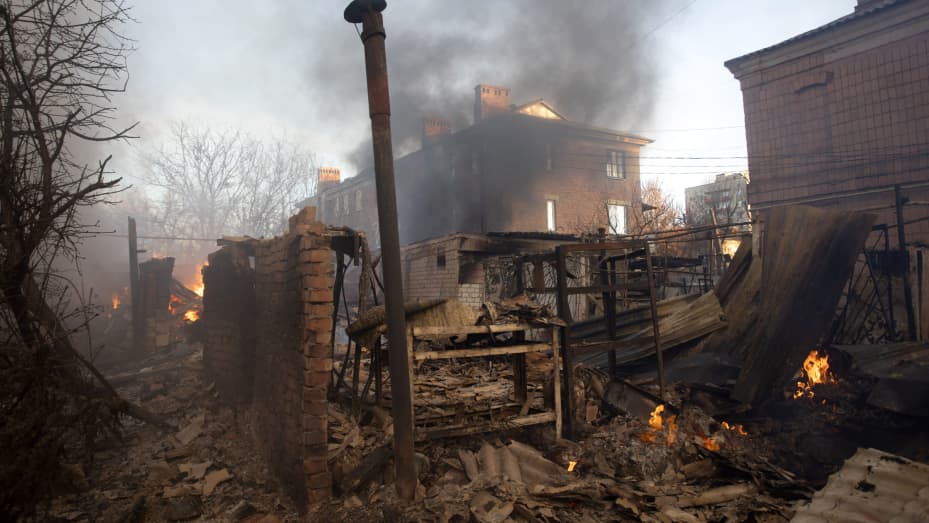 A building burns after shelling in Bakhmut, Donetsk region, on December 4, 2022, amid Russia's invasion of Ukraine.
