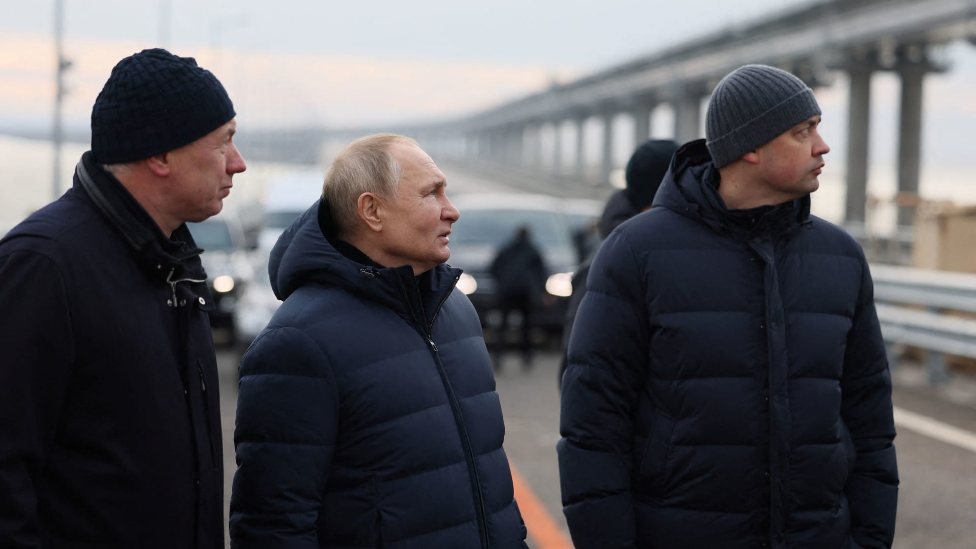 Russian President Vladimir Putin visits a bridge connecting the Russian mainland with the Crimean Peninsula across the Kerch Strait, December 5, 2022. 