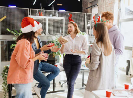 Renewing a year-end tradition, companies throw holiday parties again to bring employees back together