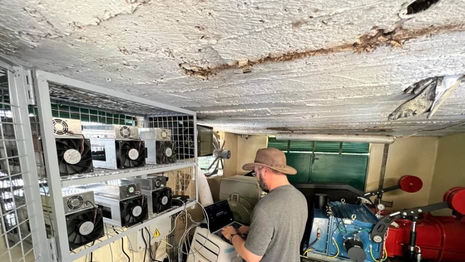 Philip Walton, Gridless co-founder and CFO, setting up a mini grid hydro site to mine with 20 kilowatts of power in Kenya.