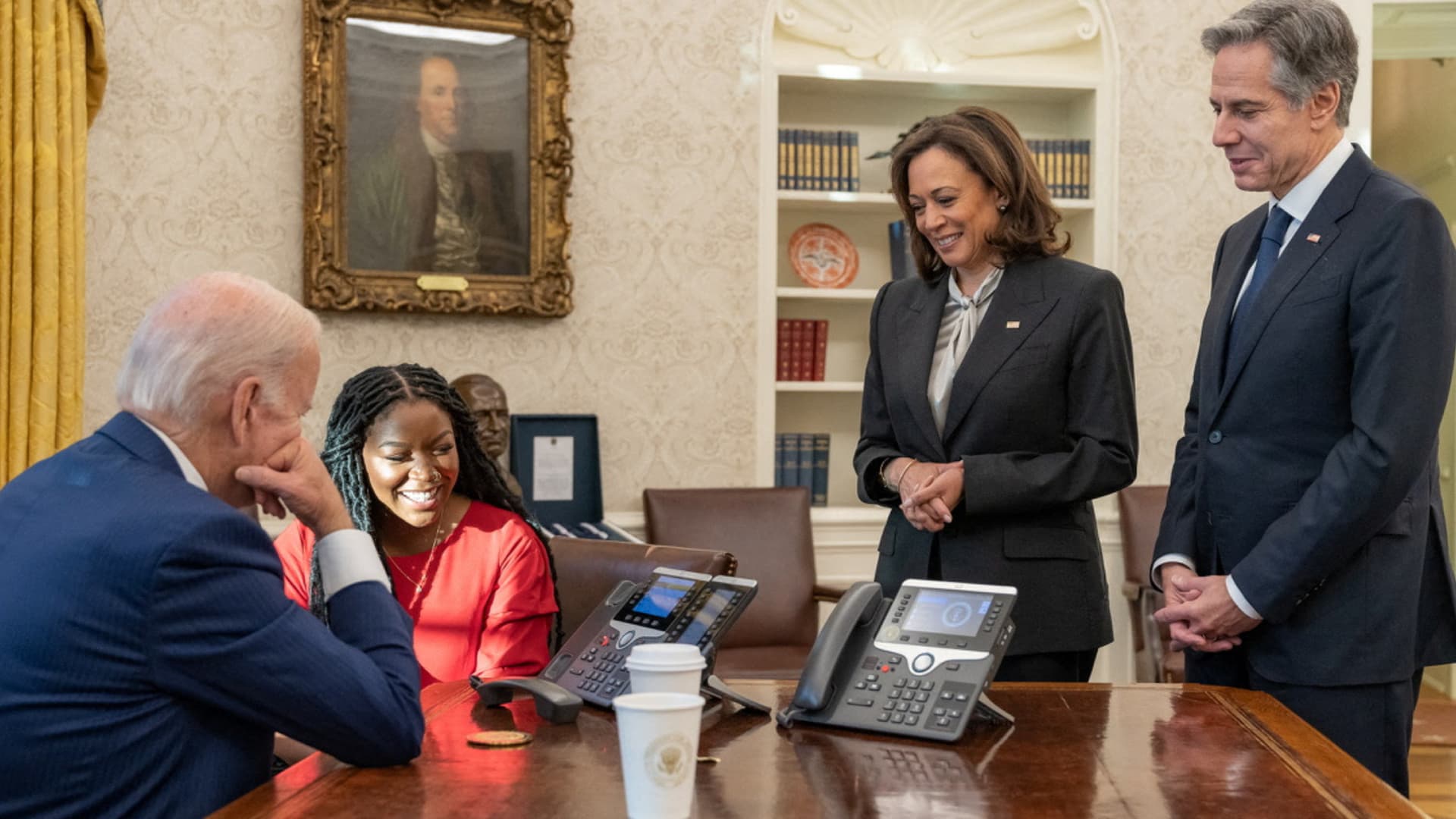 U.S. President Joe Biden and Cherelle Griner speak on the phone with WNBA basketball star Brittney Griner after her release by Russia, in this White House handout photo taken in the Oval Office, as Vice President Kamala Harris and U.S. Secretary of State Antony Blinken look on, at the White House in Washington, U.S. December 8, 2022.