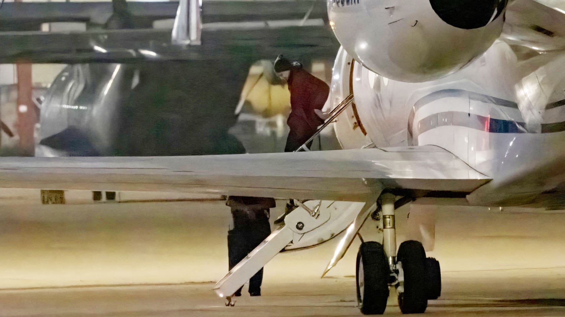 American basketball star Brittney Griner gets out of a plane after landing at the JBSA-Kelly Field Annex runway on December 9, 2022 in San Antonio, after she was released from a Russian prison in exchange for a notorious arms dealer.