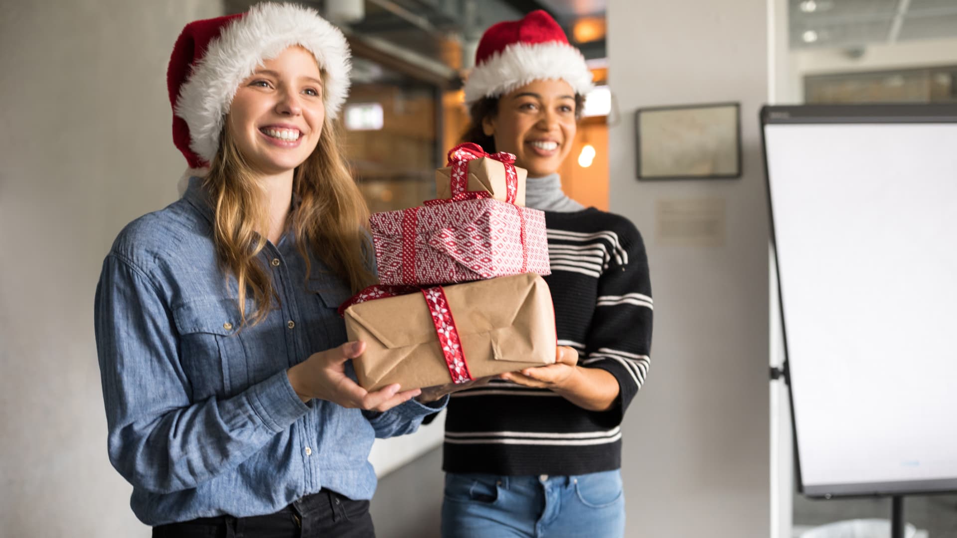 Should you buy a gift for your boss and co-workers for the holidays? HR experts weigh in
