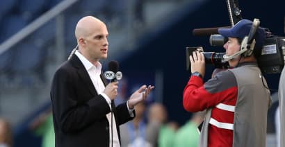 U.S. soccer journalist Grant Wahl died of an aortic aneurysm while covering World Cup in Qatar, his wife says