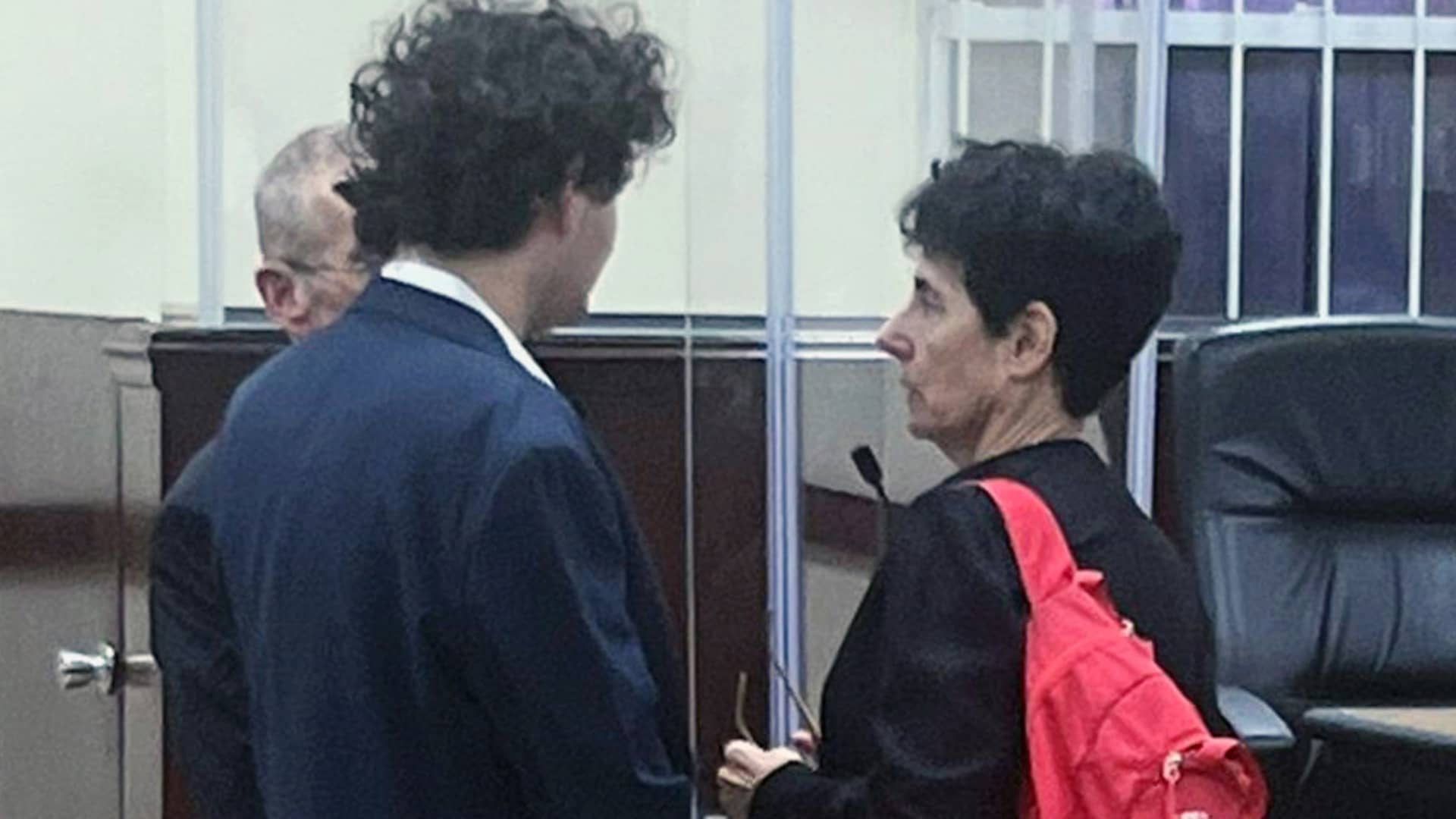 Sam Bankman-Fried, founder of FTX, left, and his mother Barbara Fried at the Magistrate's Court in Nassau, Bahamas, on Tuesday, Dec. 13, 2022. Bankman-Fried was denied bail by a judge, leaving the disgraced co-founder of crypto giant FTX behind bars. 