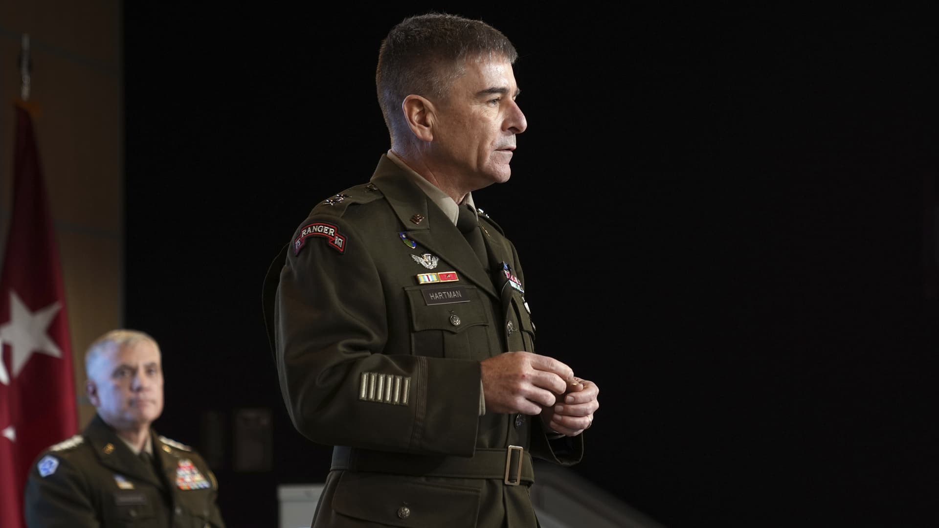 In this image provided by U.S. Cyber Command, Army Maj. Gen. William Hartman, who leads the U.S. Cyber National Mission Force, speaks during a ceremony at U.S. Cyber Command headquarters at Fort George E. Meade, Md., Monday, Dec. 19, 2022.