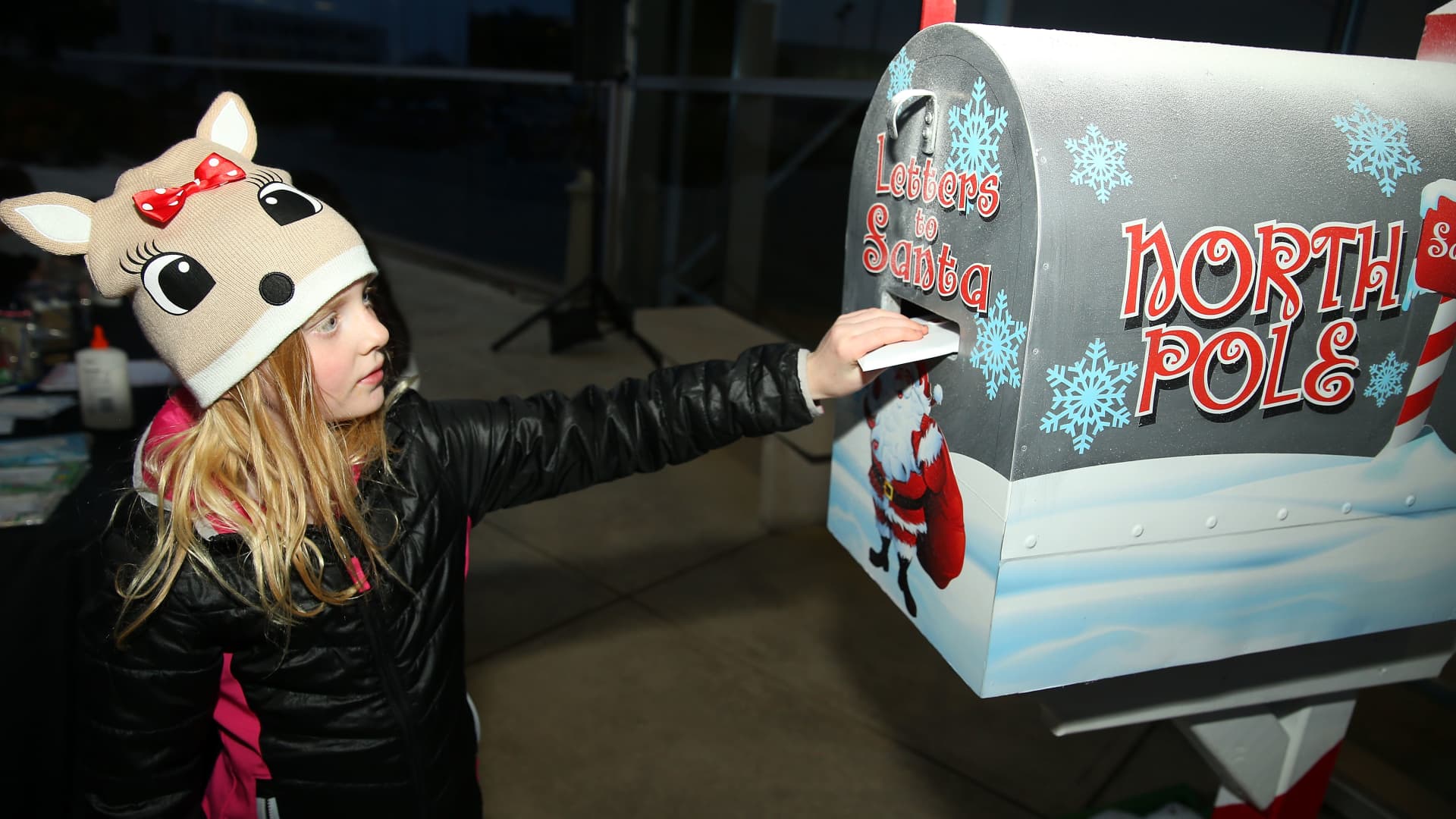 A child posts a letter to Santa Claus in Fort Worth, Texas.