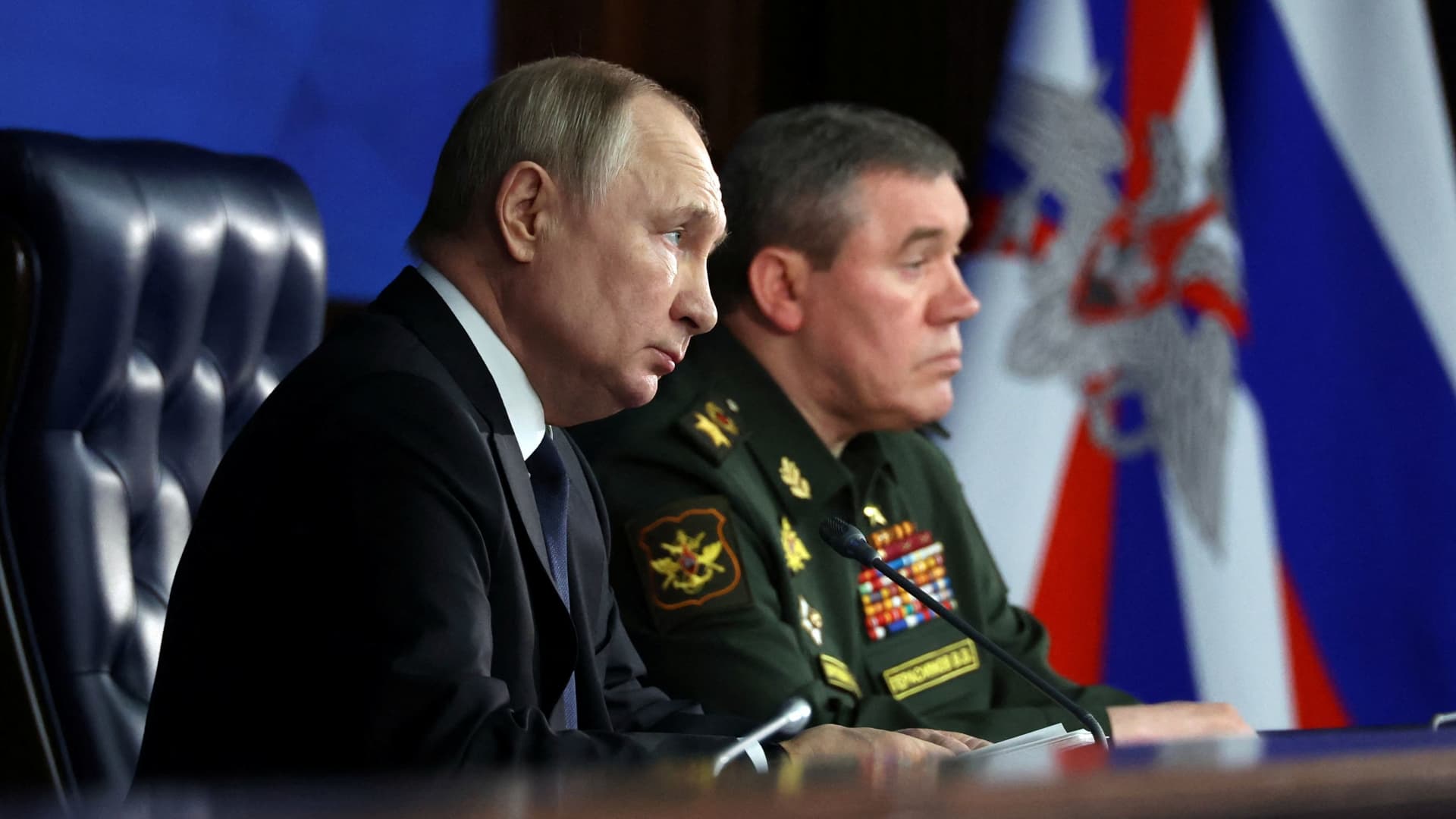 Russian President Vladimir Putin and Chief of the General Staff of Russian Armed Forces Valery Gerasimov attend an annual meeting of the Defense Ministry Board in Moscow, Russia, Dec. 21, 2022.