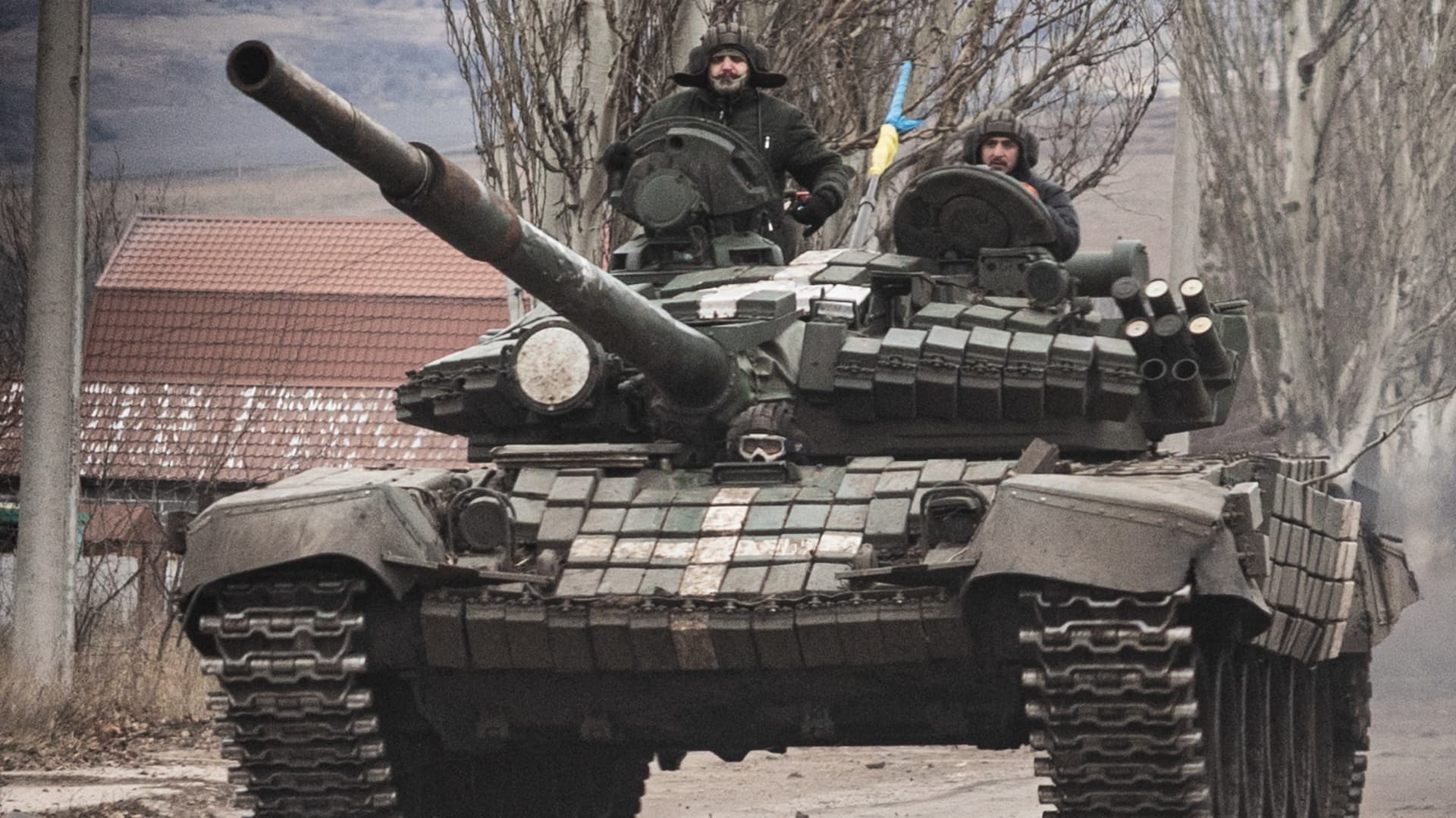 Ukrainian armed forces' soldiers drive a T-72 tank on the outskirts of Bakhmut, eastern Ukraine on December 21, 2022.