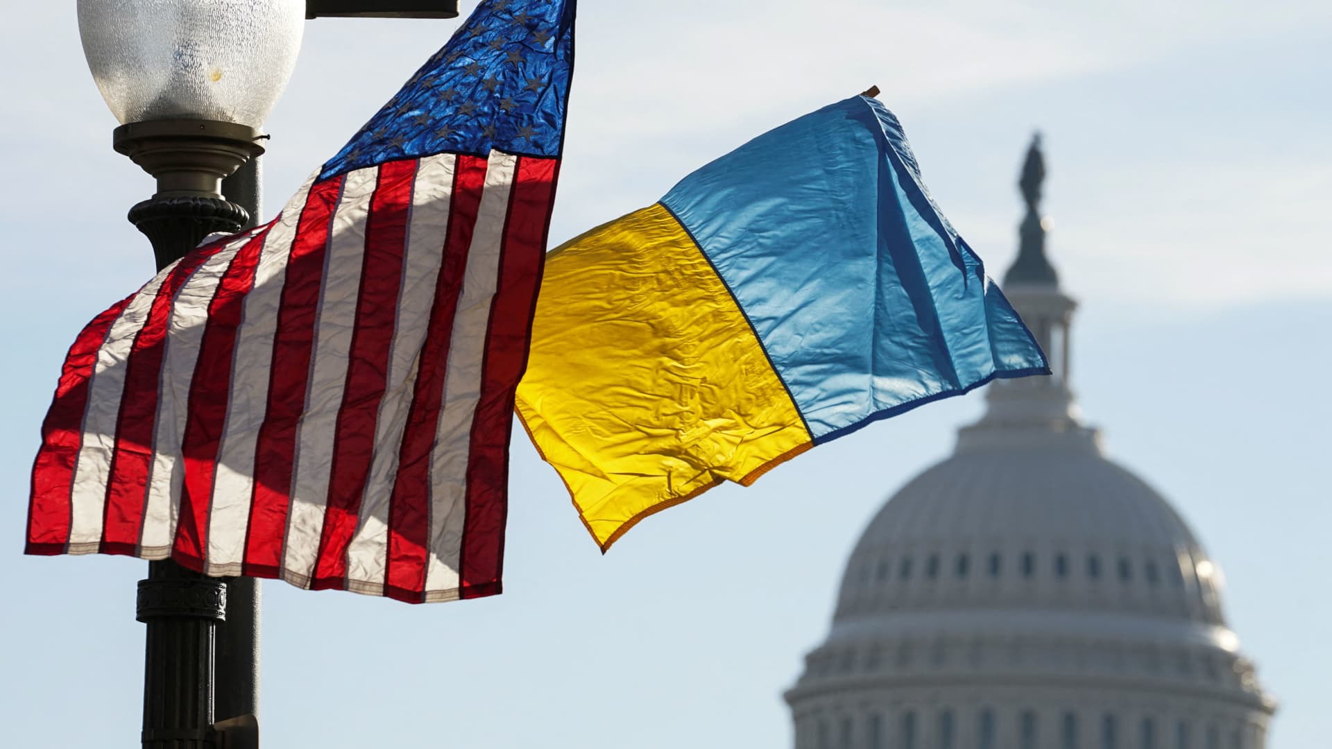 Ukrainian and U.S. flags are flown along Pennsylvania Avenue leading to the U.S. Capitol ahead of a visit by Ukraine's President Volodymyr Zelenskyy for talks with U.S. President Joe Biden and an address to a joint meeting of Congress in Washington, U.S., December 21, 2022. 