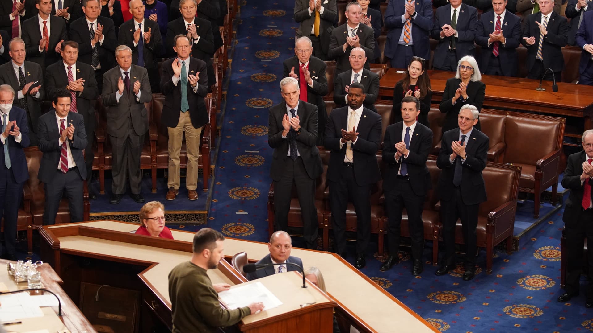 Cabinet members and members of Congress applause as Zelenskyy speaks during a joint meeting of Congress.