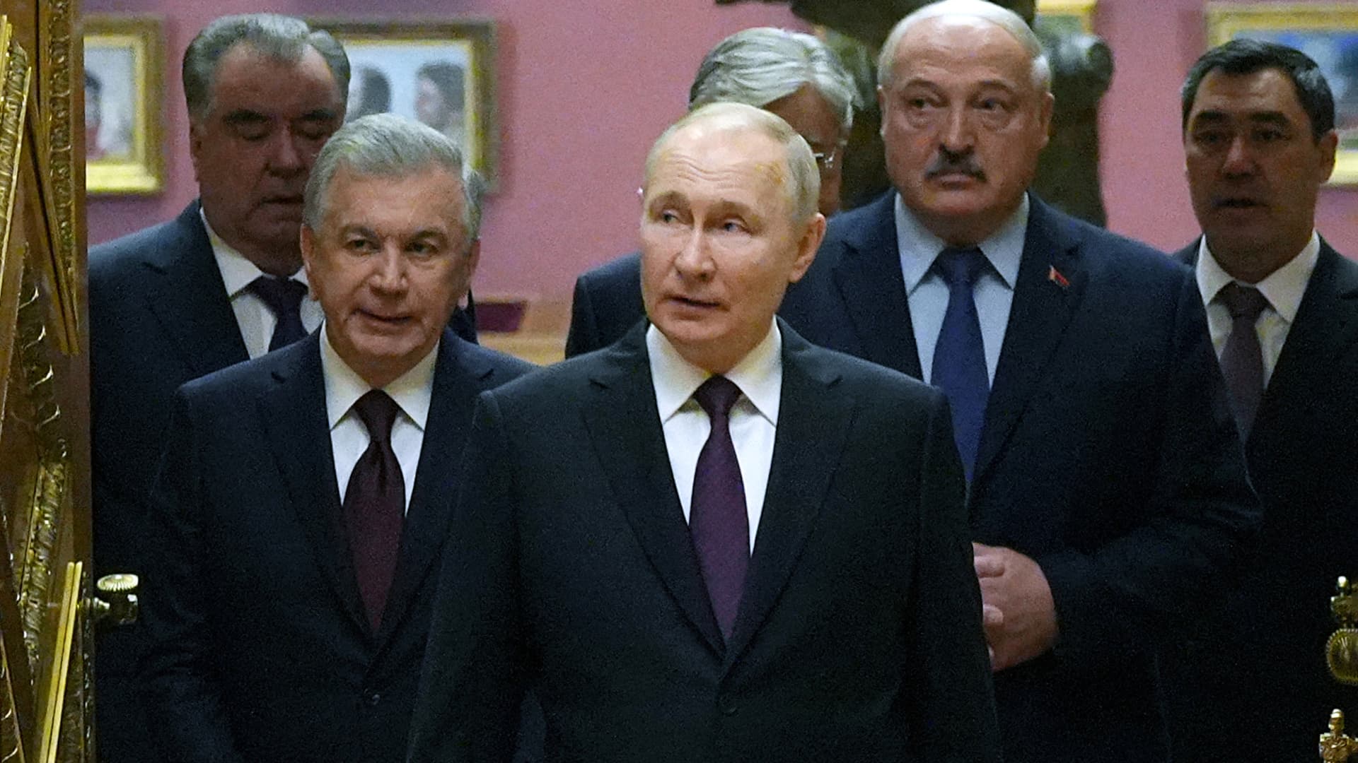 Russia's President Vladimir Putin (center), Tajikistan's President Emomali Rahmon (left), Uzbekistan's President Shavkat Mirziyoyev (second from left), Kyrgyzstan's President Sadyr Japarov (right) and Belarus' President Alexander Lukashenko enter a hall of the State Russian Museum during an informal summit of the heads of state of the Commonwealth of Independent States in St. Petersburg on Dec. 27, 2022.