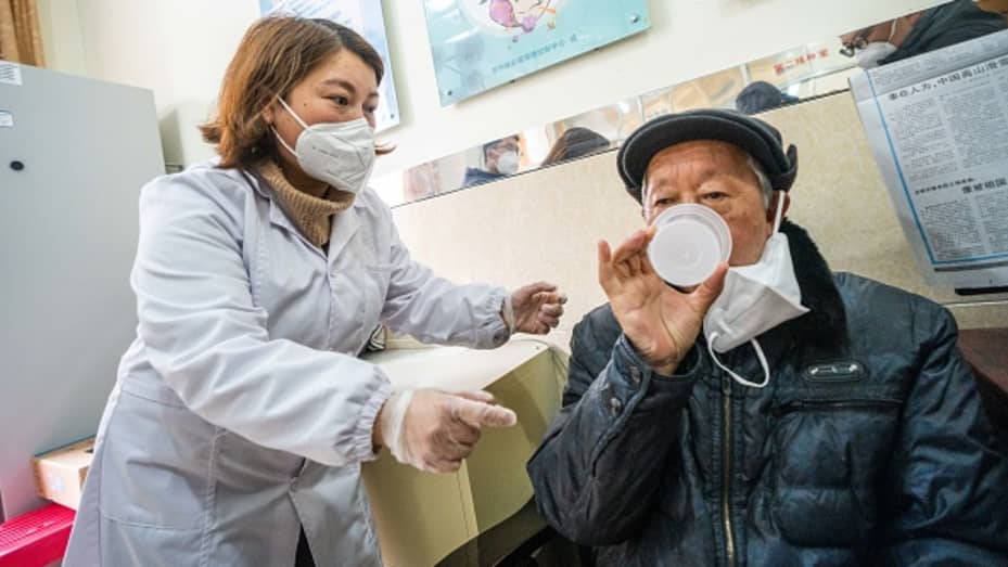People receive inhaled COVID-19 vaccine at the Center for Disease Control and Prevention in Bijie, Guizhou province, China, December 29, 2022.