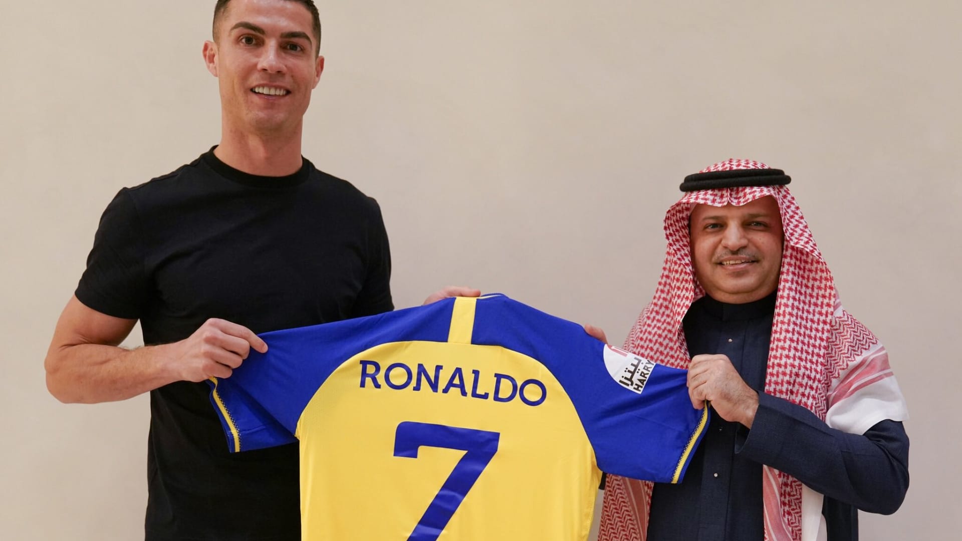 Portuguese football star Cristiano Ronaldo poses for a photo with the jersey after signing with Saudi Arabia's Al-Nassr Football Club in Riyadh, Saudi Arabia on December 30, 2022.