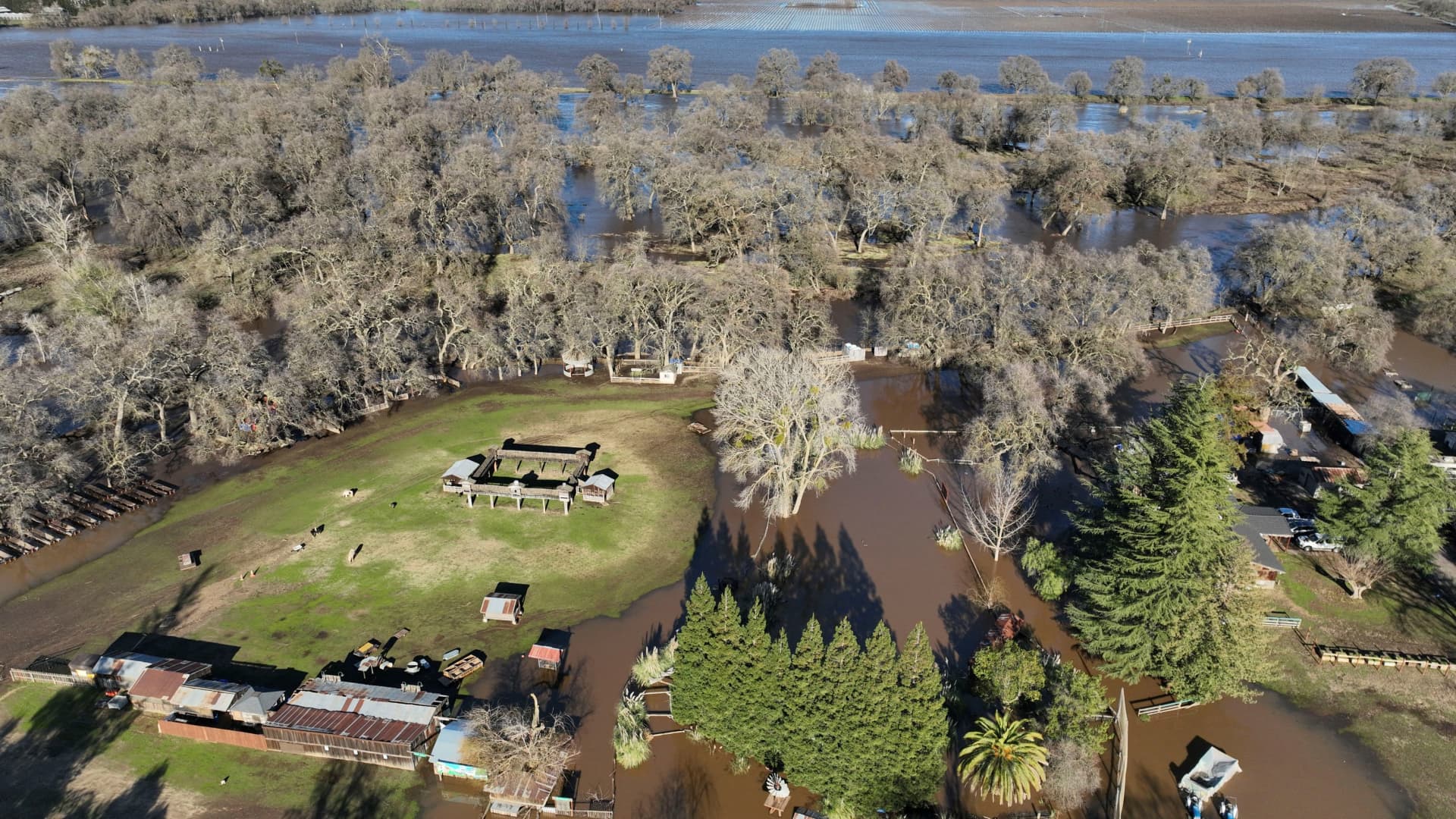 An aerial view shows the damage after rainstorms caused a levee to break, flooding Sacramento County roads near Wilton, California, U.S., January 1, 2023.