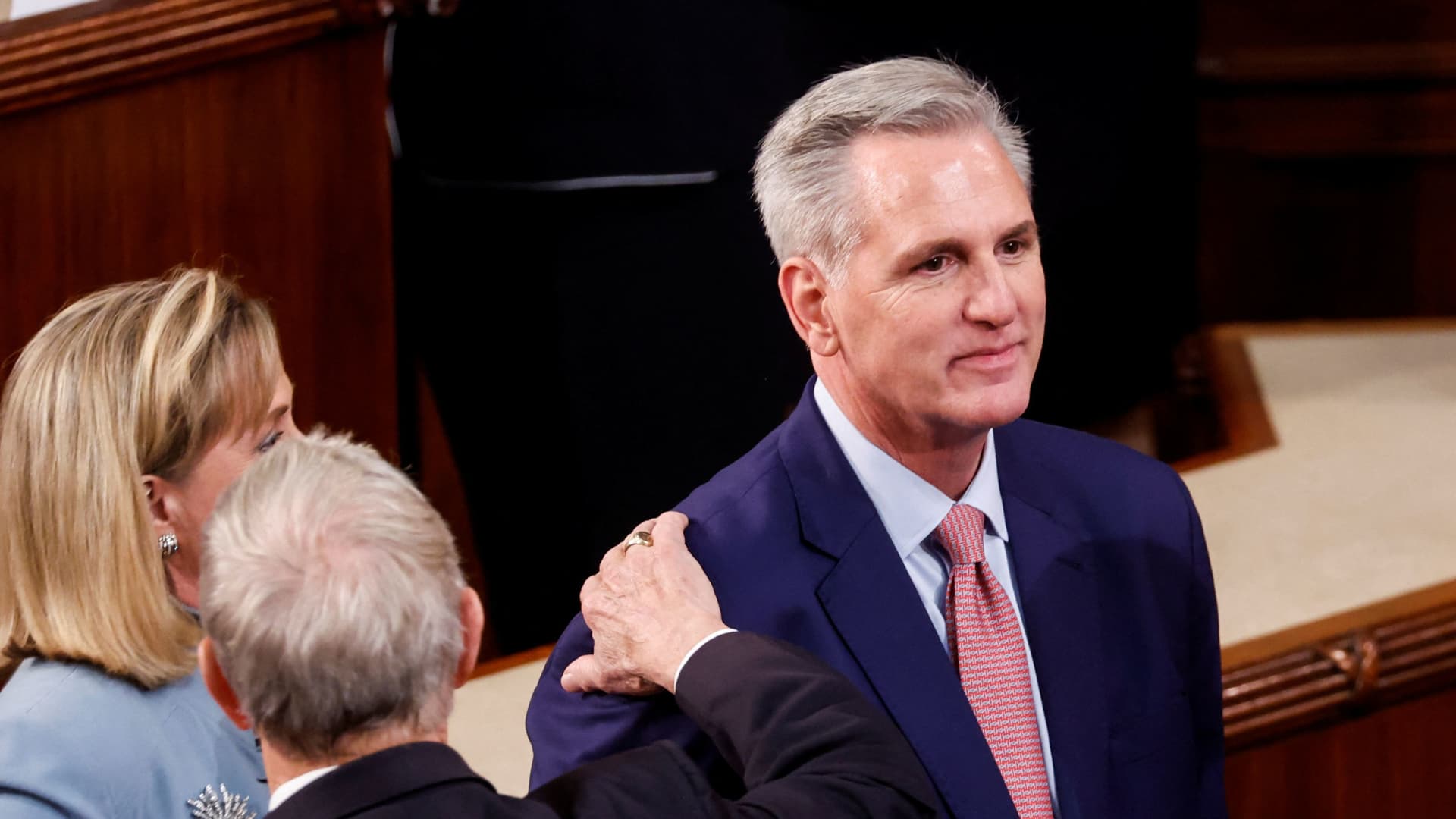 U.S. House Republican Leader Kevin McCarthy (R-CA) gets a pat on the back from one of his House colleagues prior to a fourth round of voting for a new House Speaker on the second day of the 118th Congress at the U.S. Capitol in Washington, U.S., January 4, 2023. 