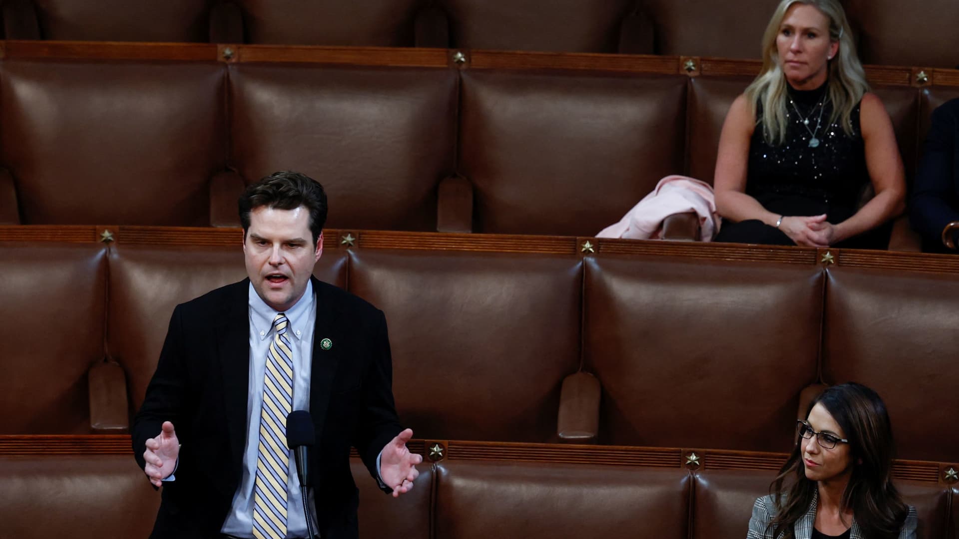 U.S. Rep. Matt Gaetz (R-FL) nominates former President Donald Trump for Speaker of the House as Rep. Marjorie Taylor Greene (R-GA) and Rep. Lauren Boebert (R-CO) watch inside the House Chamber on the third day of the 118th Congress at the U.S. Capitol in Washington, U.S., January 5, 2023. 