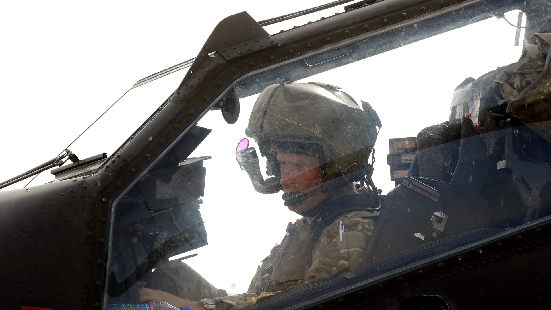 Prince Harry sits in the front cockpit of an Apache helicopter at the British controlled flight-line in Camp Bastion on October 31, 2012 in Afghanistan. Prince Harry served as an Apache Helicopter Pilot/Gunner with 662 Sqd Army Air Corps, from September 2012 for four months until January 2013.
