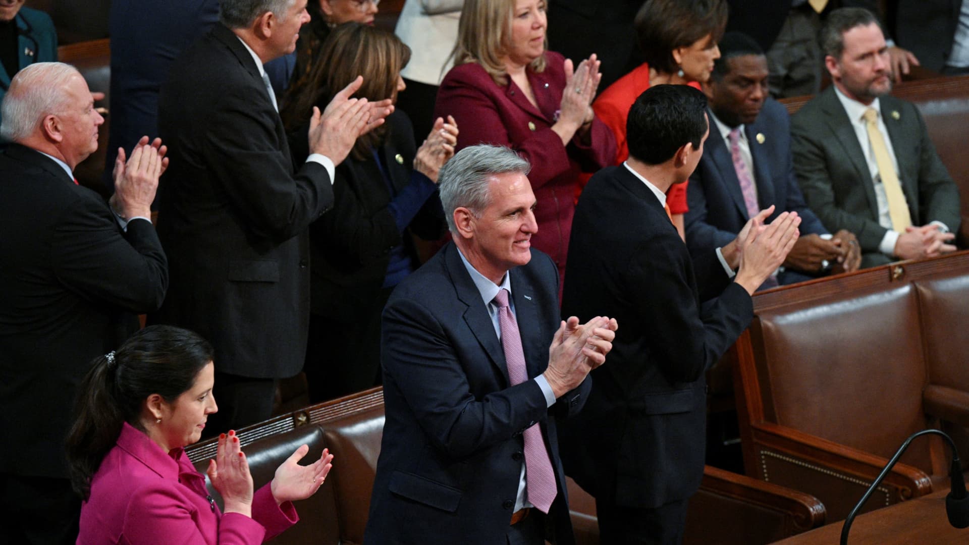 U.S. House Republican Leader Kevin McCarthy (R-CA) applauds with Republican Conference Chair Elise Stefanik (R-NY) and other supporters as another conservative member's vote flips to voting for McCarthy in the 12th round of voting for a new Speaker on the 4th day of the 118th Congress at the U.S. Capitol in Washington, U.S., January 6, 2023. 