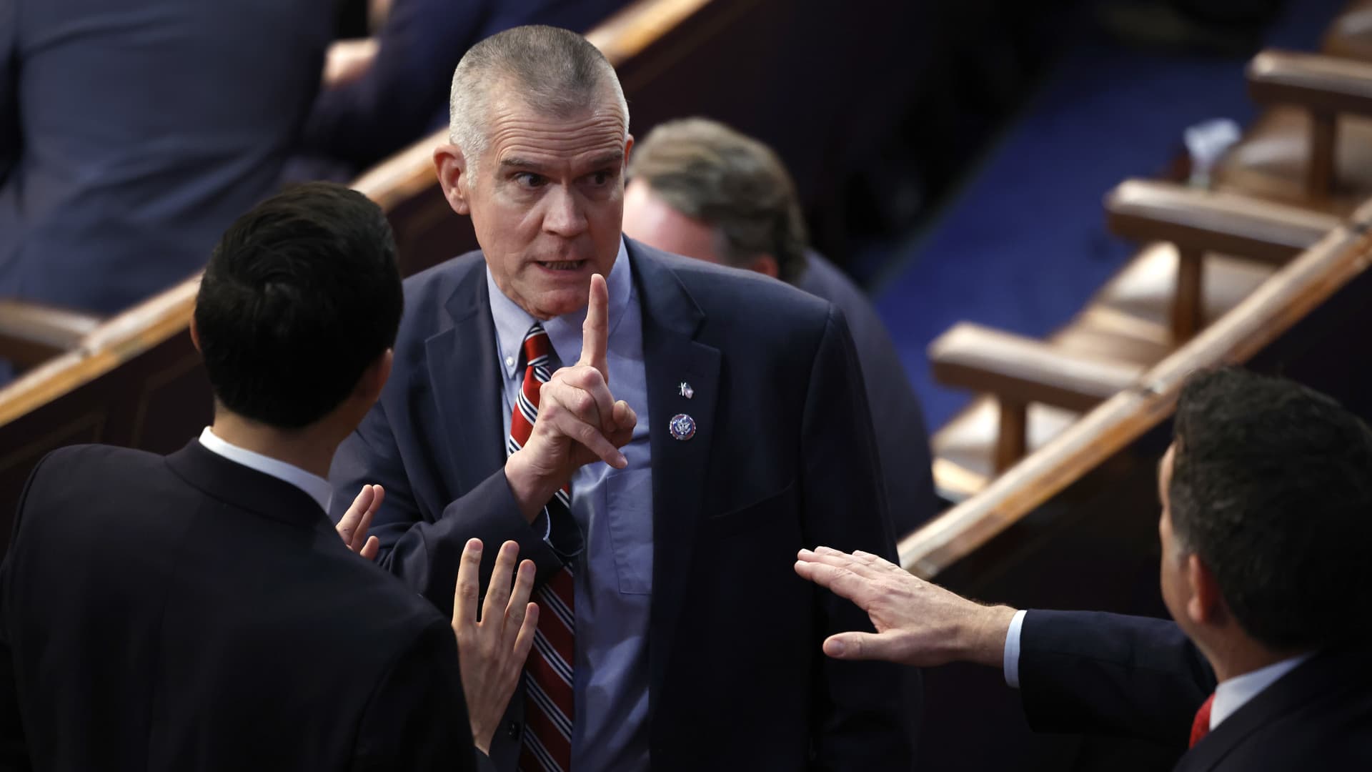 WASHINGTON, DC - JANUARY 06: U.S. Rep.-elect Matt Rosendale(R-MT) (C) talks to Rep.-elect Mark Green (R-TN) (R) and John Leganski, Deputy Chief of Staff for House Republican Leader Kevin McCarthy (R-CA), in the House Chamber during the fourth day of elections for Speaker of the House at the U.S. Capitol Building on January 06, 2023 in Washington, DC. The House of Representatives is meeting to vote for the next Speaker after House Republican Leader Kevin McCarthy (R-CA) failed to earn more than 218 votes on several ballots; the first time in 100 years that the Speaker was not elected on the first ballot.(Photo by Chip Somodevilla/Getty Images)