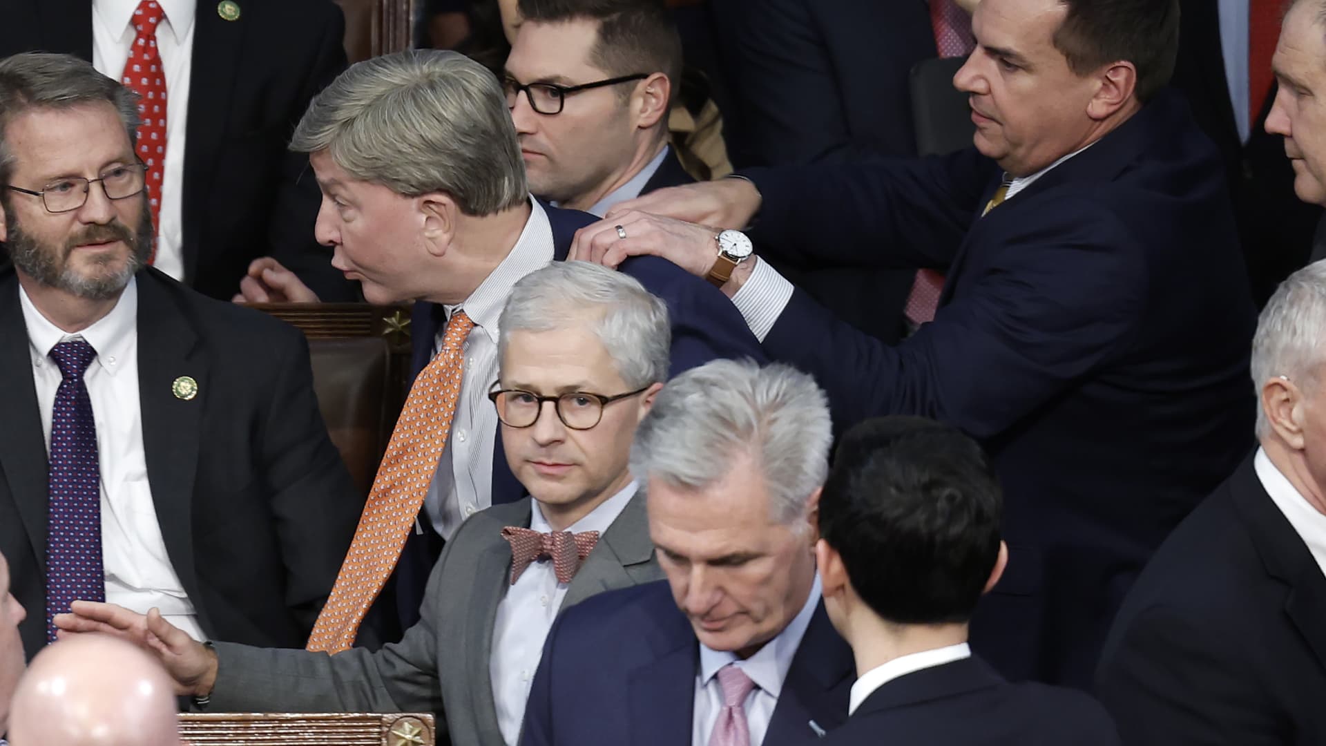 WASHINGTON, DC - JANUARY 06: U.S. Rep.-elect Mike Rogers (R-AL) (C) is restrained by Rep.-elect Richard Hudson (R-NC) after getting into an argument with Rep.-elect Matt Gaetz (R-FL) in the House Chamber during the fourth day of elections for Speaker of the House at the U.S. Capitol Building on January 06, 2023 in Washington, DC.