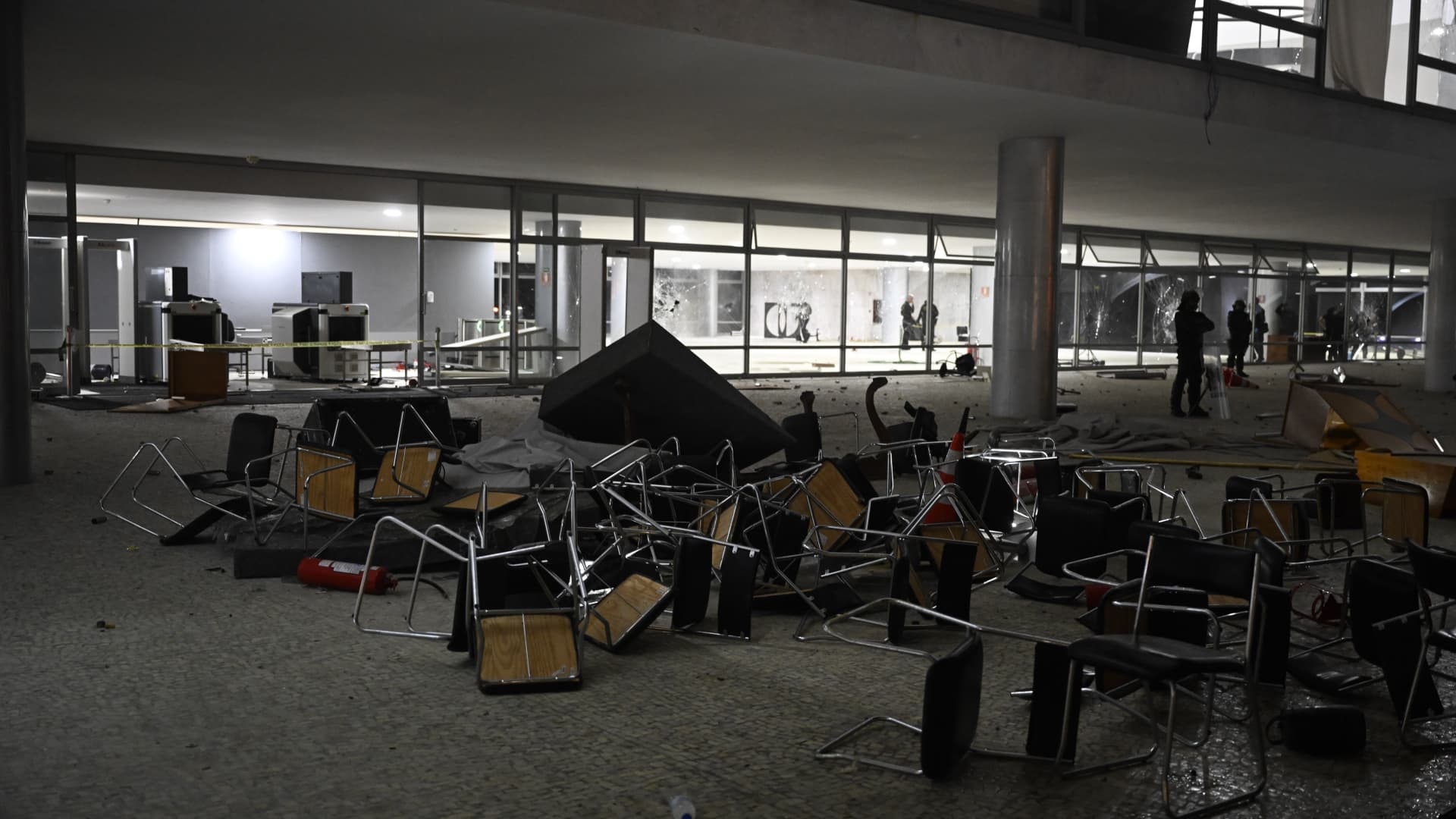 BRASILIA, Brazil - Jan. 08, 2023: Damaged furniture are seen piled in front of the Palacio do Planalto (the official workplace of the president of Brazil) following a protest by supporters of Brazil's former President Jair Bolsonaro against President Luiz Inacio Lula da Silva.