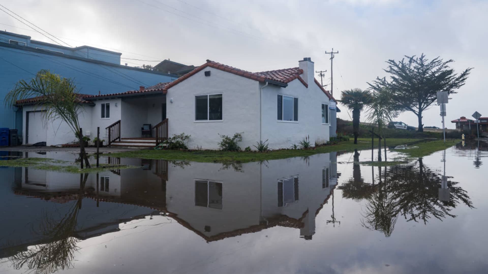 A flooded street after a rain storm in the Aptos Beach Flats neighborhood in Aptos, California, US, on Sunday, Jan. 8, 2023.