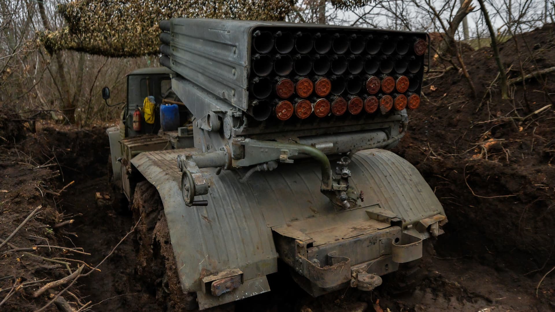 A Ukrainian multiple-launch rocket system is hiding among the trees near Soledar as the fighting in the Donbas region continues.