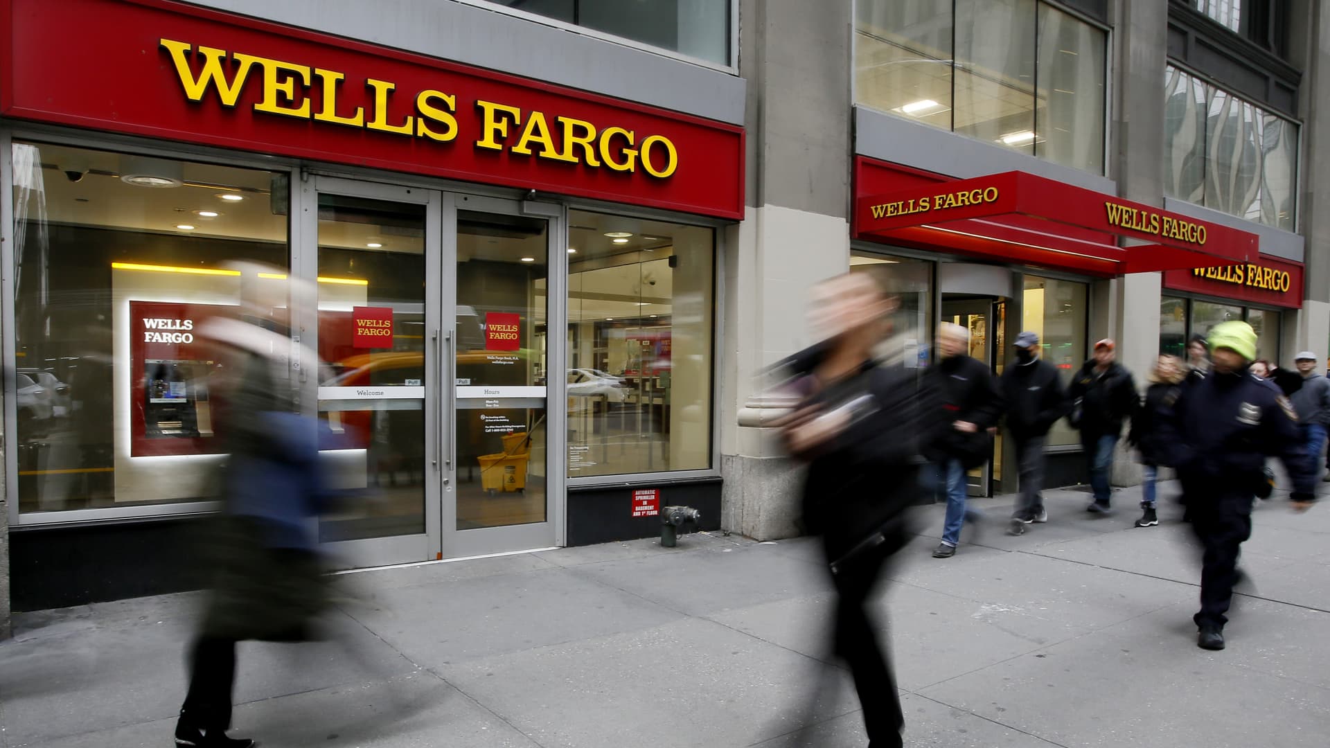 People walk past a Wells Fargo branch on January 10, 2023 in New York City.