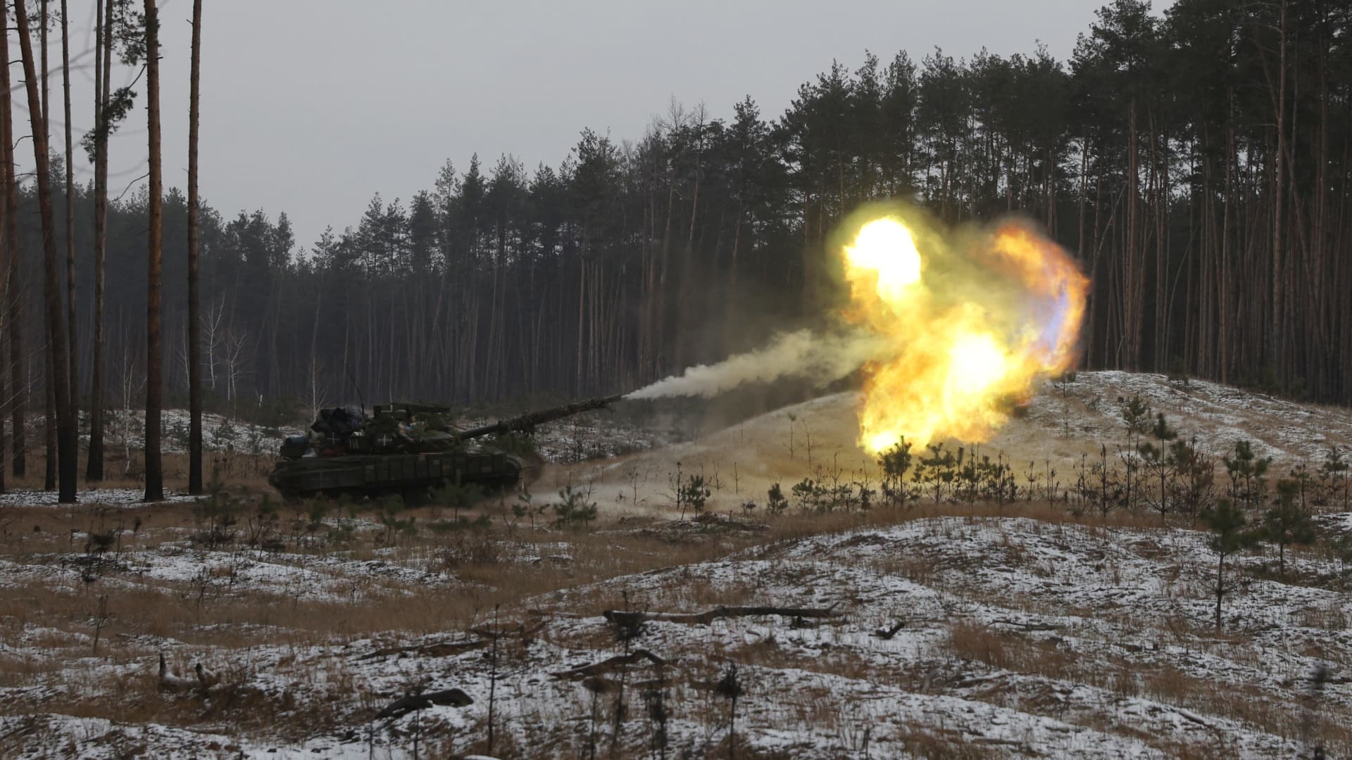 A Ukrainian tank fires at Russian positions near Kreminna, Lugansk region, on January 12, 2023, amid the Russian invasion of Ukraine.