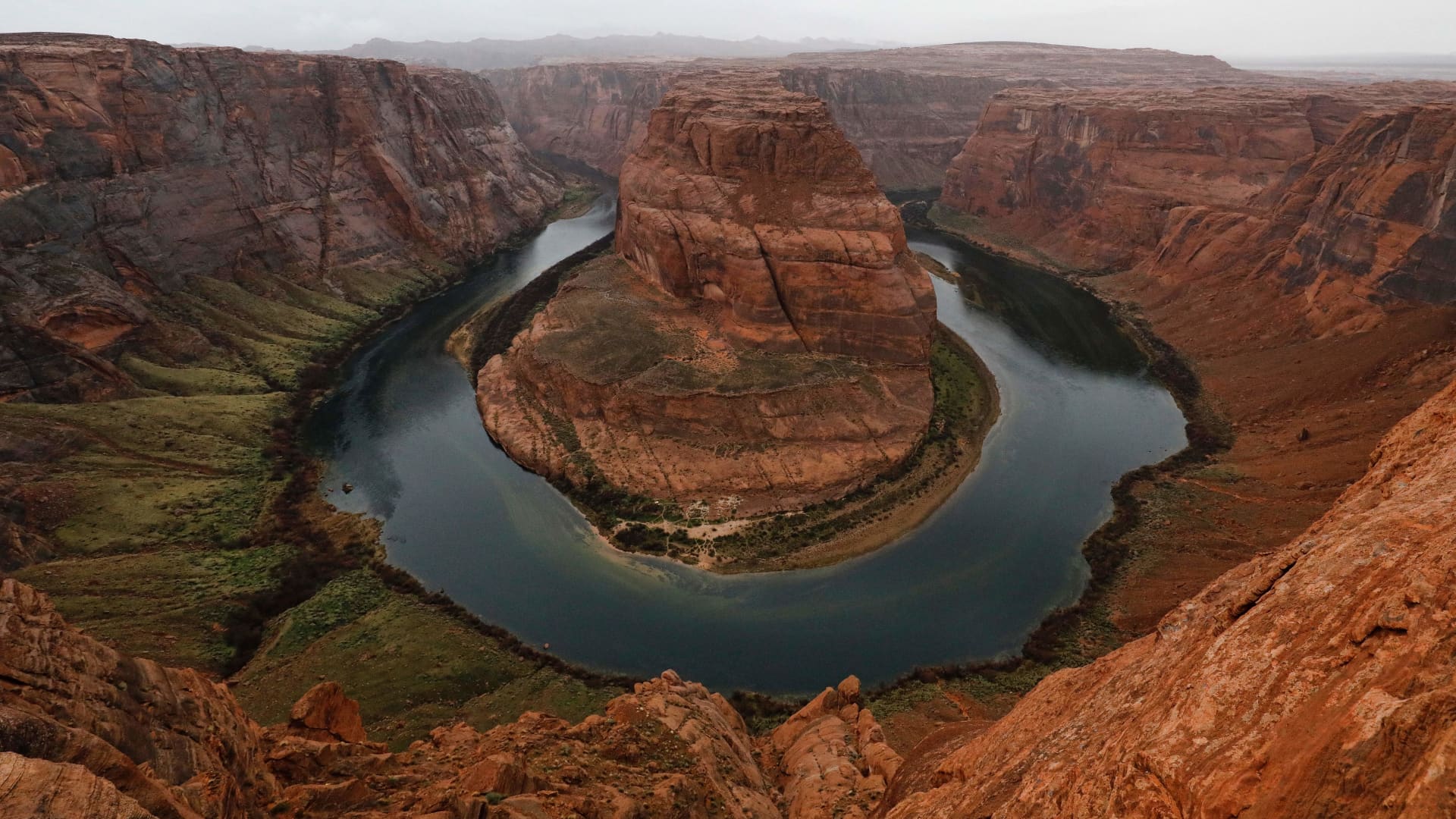 The Colorado River wraps around Horseshoe Bend in the in Glen Canyon National Recreation Area in Page, Arizona.