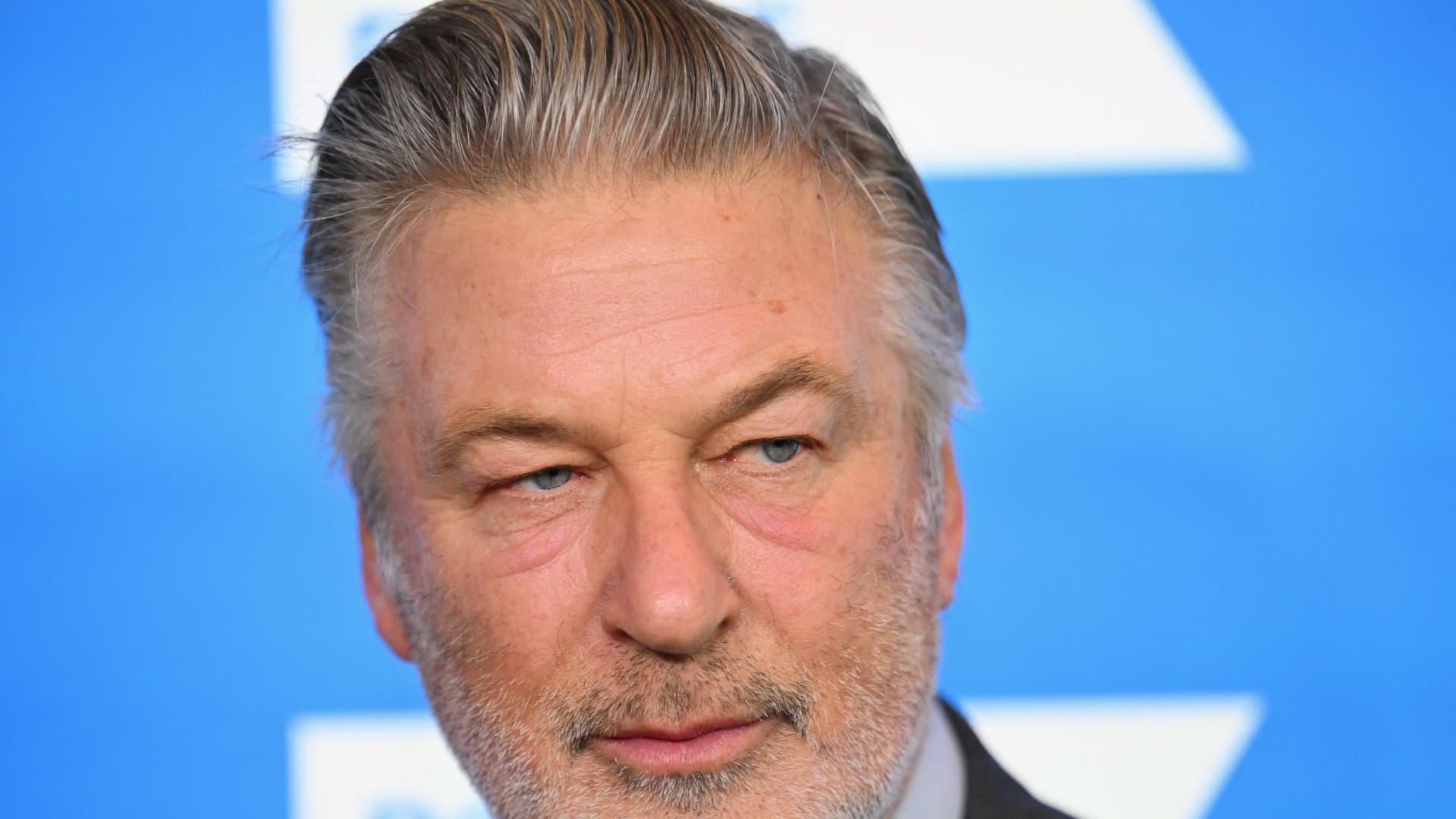 Alec Baldwin charged in 'Rust' shooting, prosecutors say he was 'distracted' during training - CNBC
