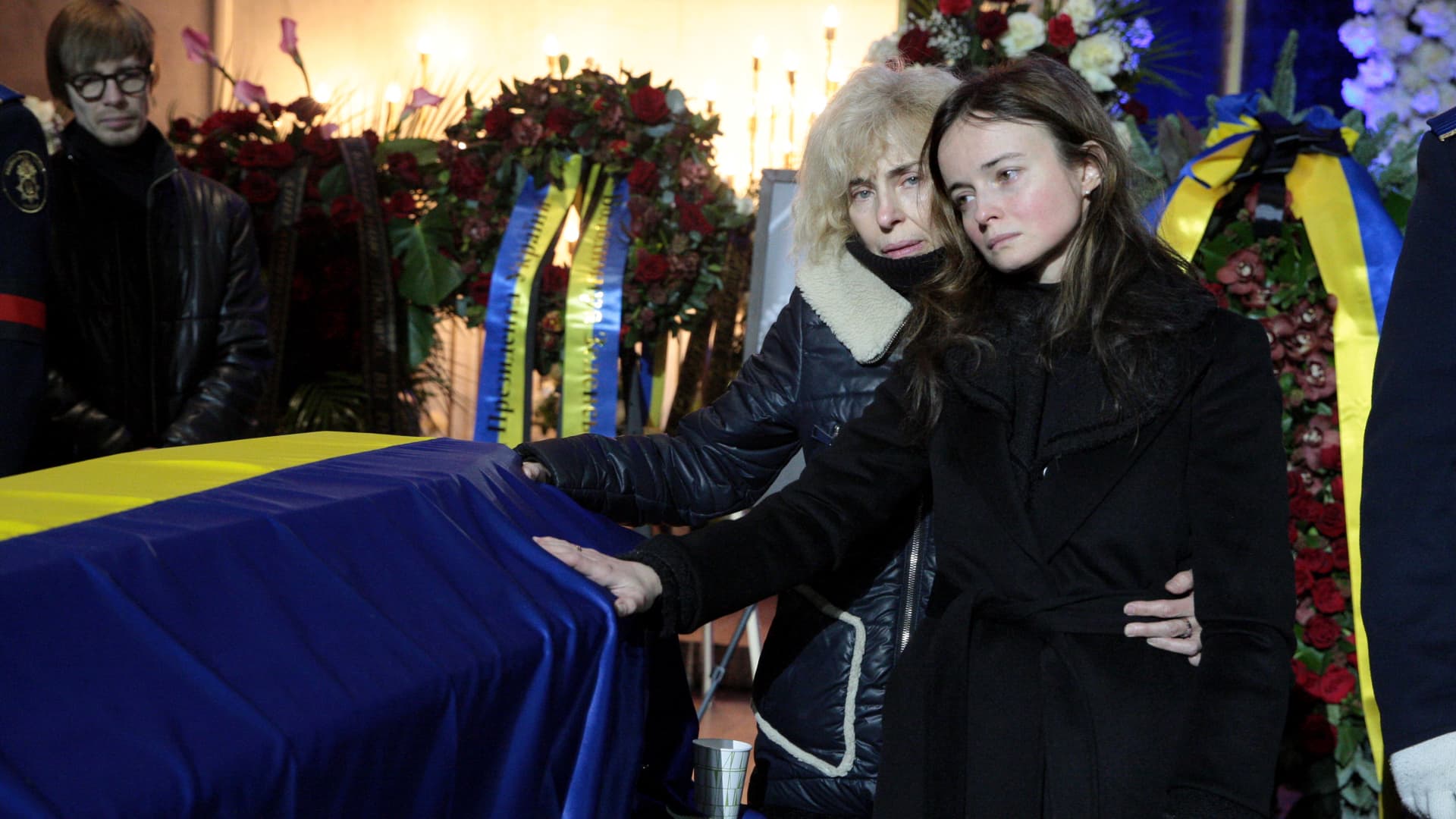 Relatives mourn late First Deputy Minister of Internal Affairs of Ukraine Yevhenii Yenin during the lying-in-state ceremony of the leadership of the Ukrainian Ministry of Internal Affairs who perished in the Brovary helicopter crash at the Ukrainian House, Kyiv, capital of Ukraine.