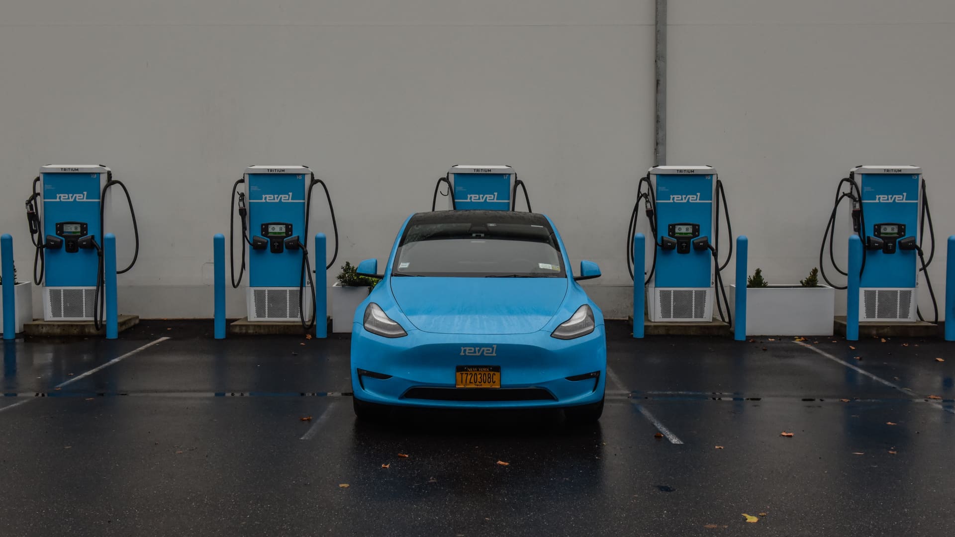 An electric vehicle (EV) charging at the Revel charging station in the Brooklyn borough of New York, U.S., on Monday, Oct. 24, 2022.