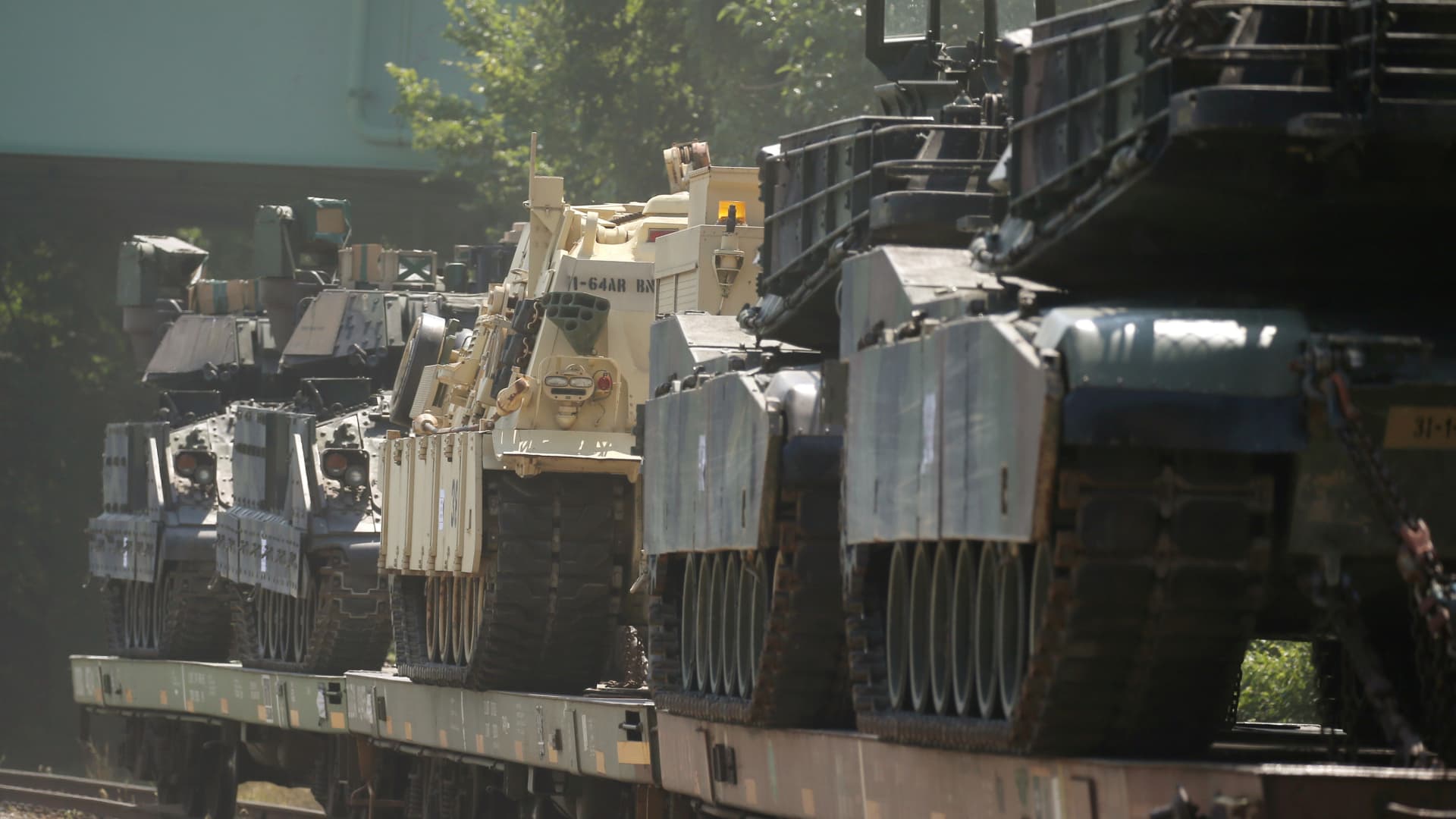 M1 Abrams tanks and other armored vehicles sit atop flat cars in a rail yard after U.S. President Donald Trump said tanks and other military hardware would be part of Fourth of July displays of military prowess in Washington, U.S., July 2, 2019. 