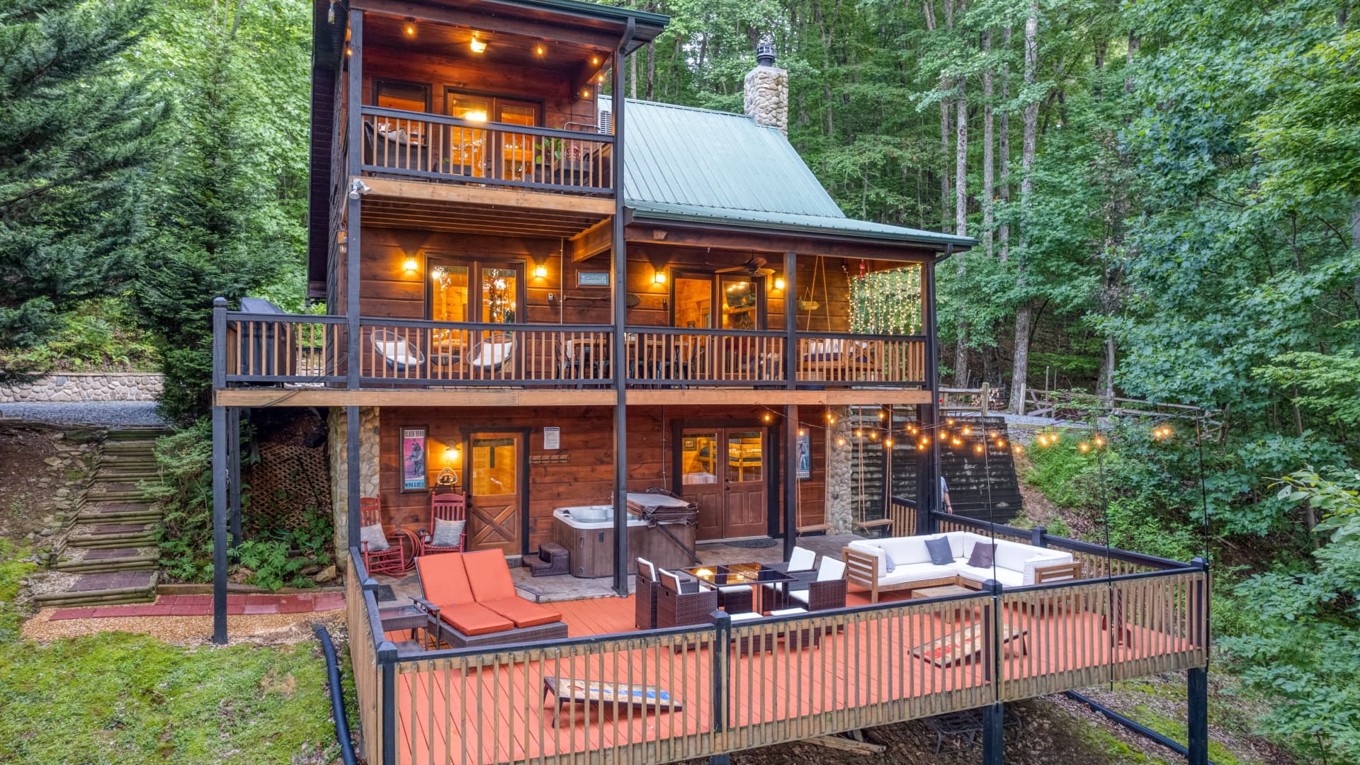 This cabin at Highlands Hideaway in Blue Ridge, Georgia features three bedrooms and three full bathrooms.