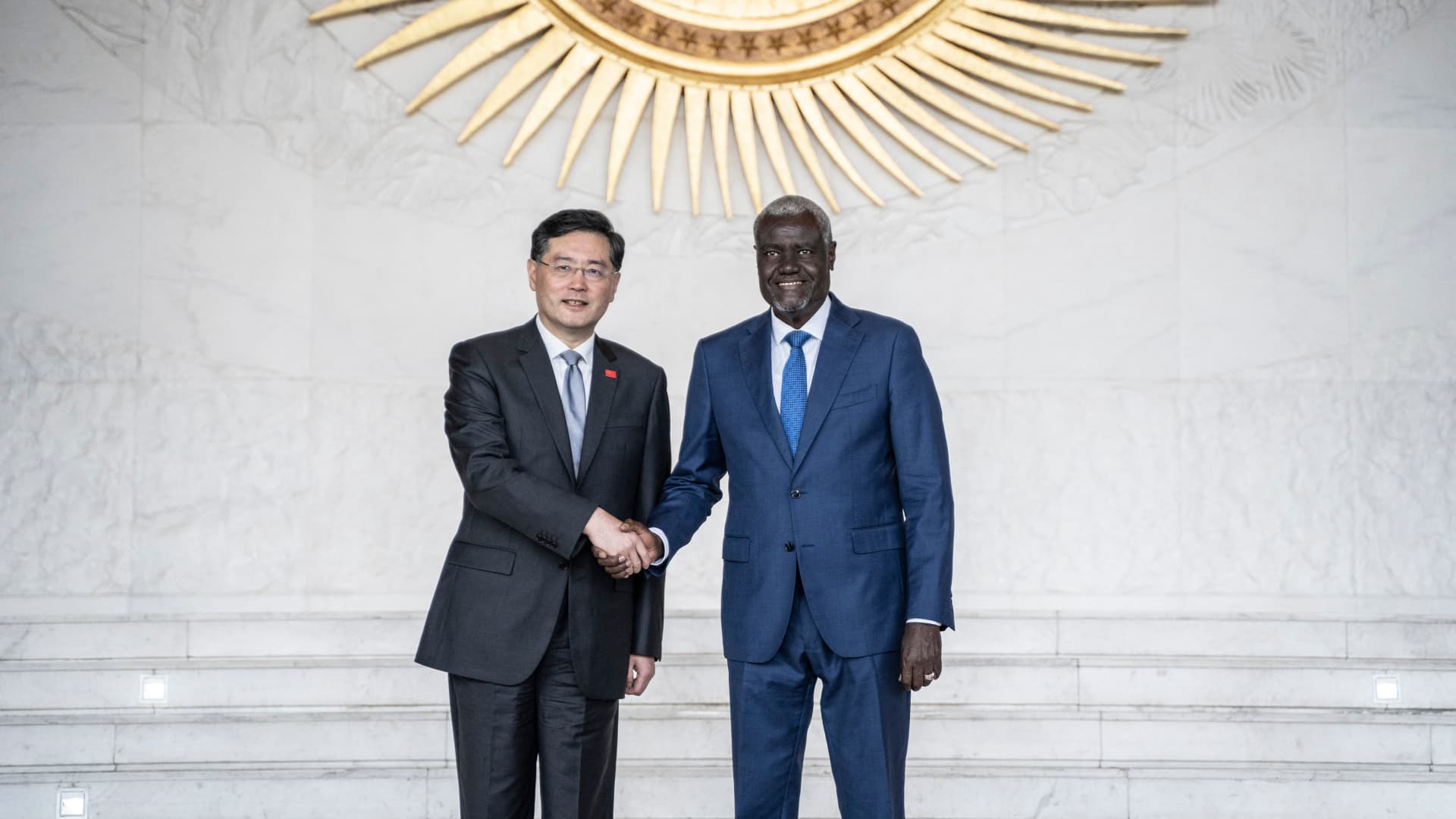 ADDIS ABABA, Ethiopia - Jan. 11, 2023: China's Foreign Minister Qin Gang (L) and Moussa Faki (R), Chairperson of the African Union (AU) Commission, shake hands during their meeting at the Africa Union headquarters.