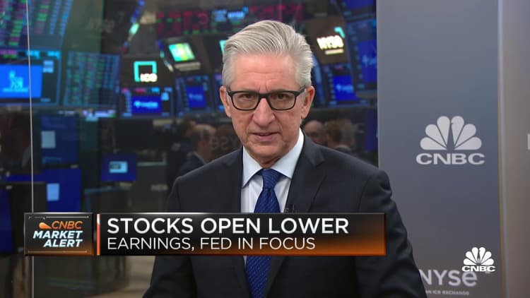Stocks open lower as earnings comes into focus