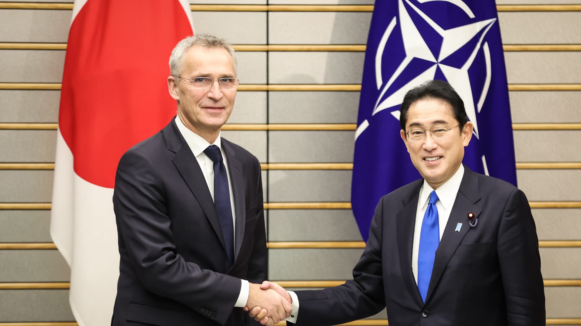General Jens Stoltenberg (left) shakes hands with Japanese Prime Minister Fumio Kishida (right) on Jan. 31, 2023 in Tokyo, Japan. Stoltenberg visits Japan to strengthen bilateral ties between the country and the E.U.