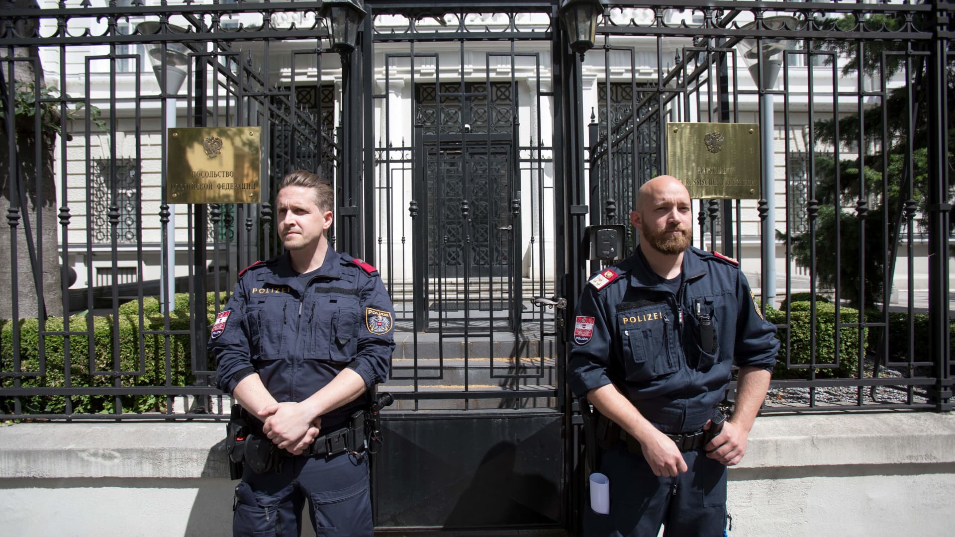 Austrian police stand guard in front of the Russian embassy in Vienna.