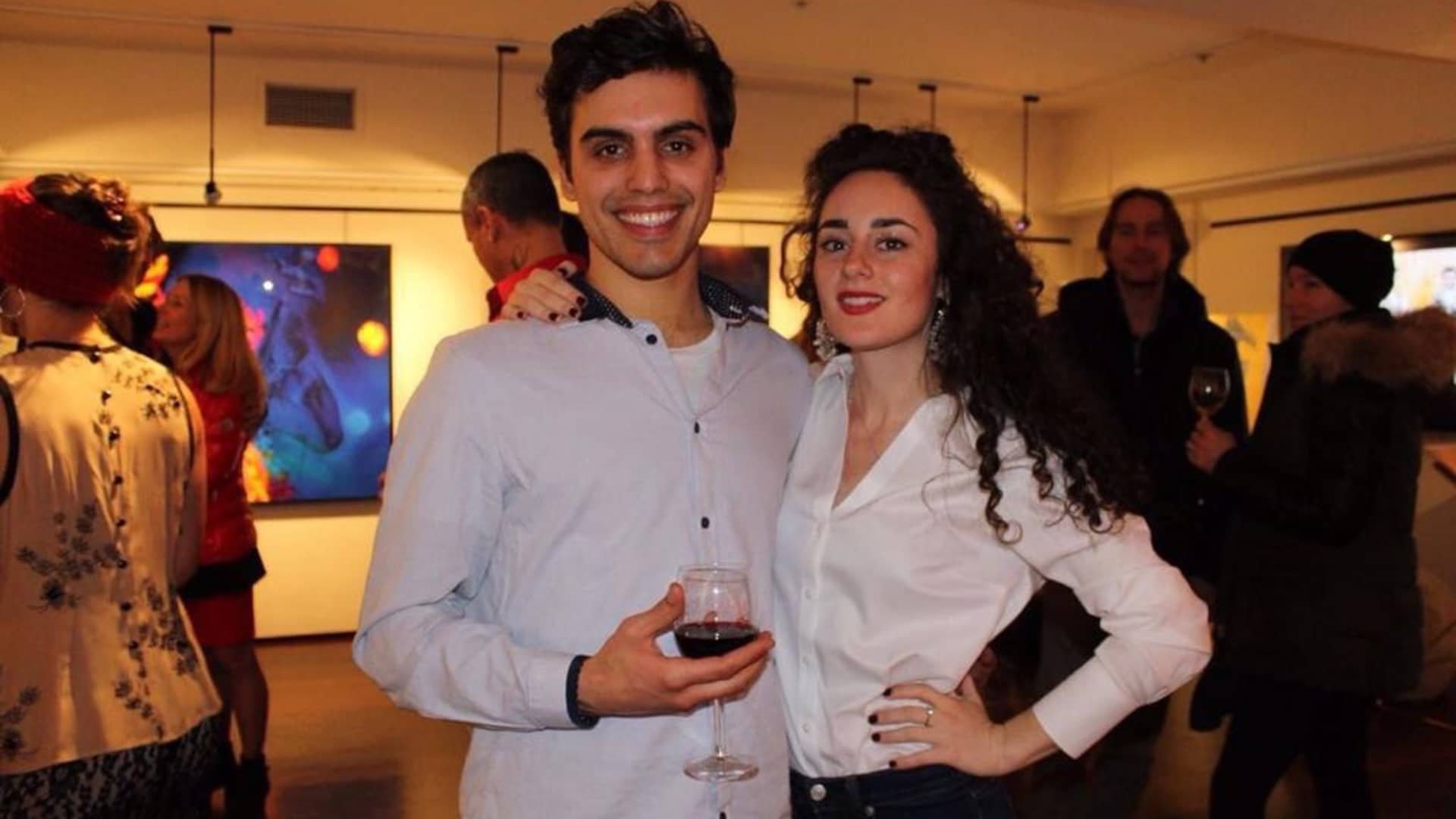 Lucas and Yana Bononi at an art exhibition.