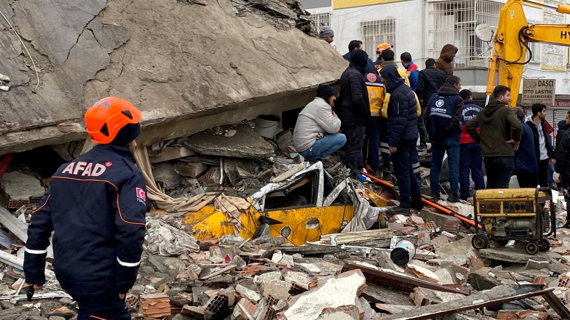 People search through rubble following an earthquake in Diyarbakir, Turkey February 6, 2023.