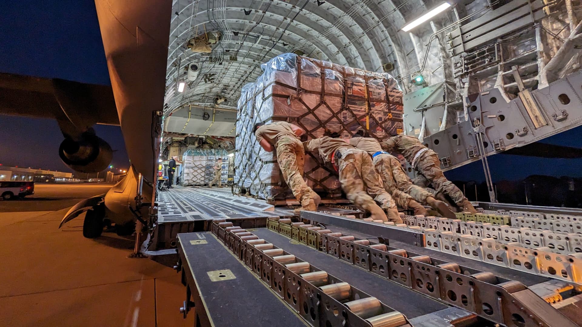 Equipment and supplies for the Urban Search and Rescue team from Fairfax, Virginia, and USAID to help in support operations for victims of the earthquake in Turkey are loaded onto a transport plane at Dover Air Force Base, Delaware, U.S., in this handout photo released on February 7, 2023. 