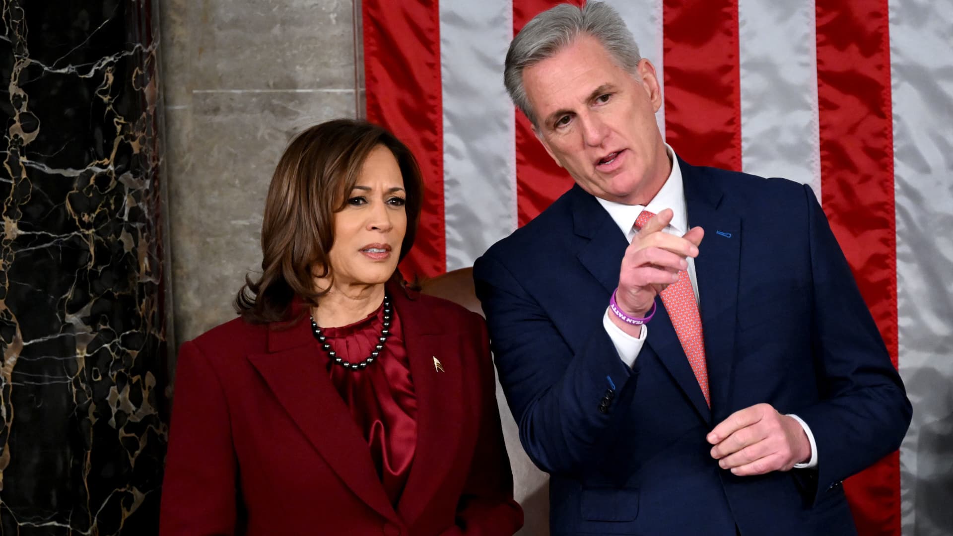US Vice President Kamala Harris speaks with US Speaker of the House Kevin McCarthy (R-CA) prior to US President Joe Biden's State of the Union address in the House Chamber of the US Capitol in Washington, DC, on February 7, 2023. 