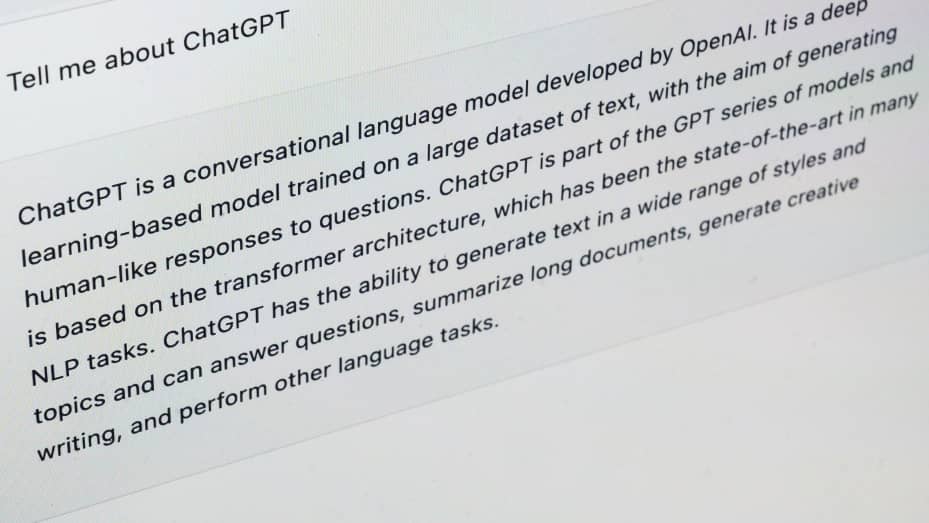 ChatGPT provides an AI-generated answer to the query "Tell me about ChatGPT."