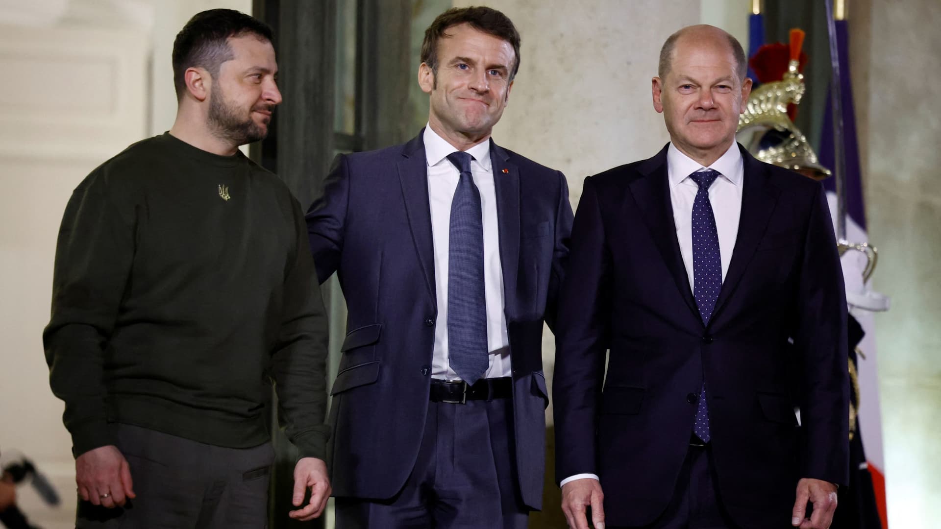 French President Emmanuel Macron welcomes Ukraine's President Volodymyr Zelenskyy and German Chancellor Olaf Scholz for a meeting at the Elysee Palace in Paris, France, February 8, 2023.